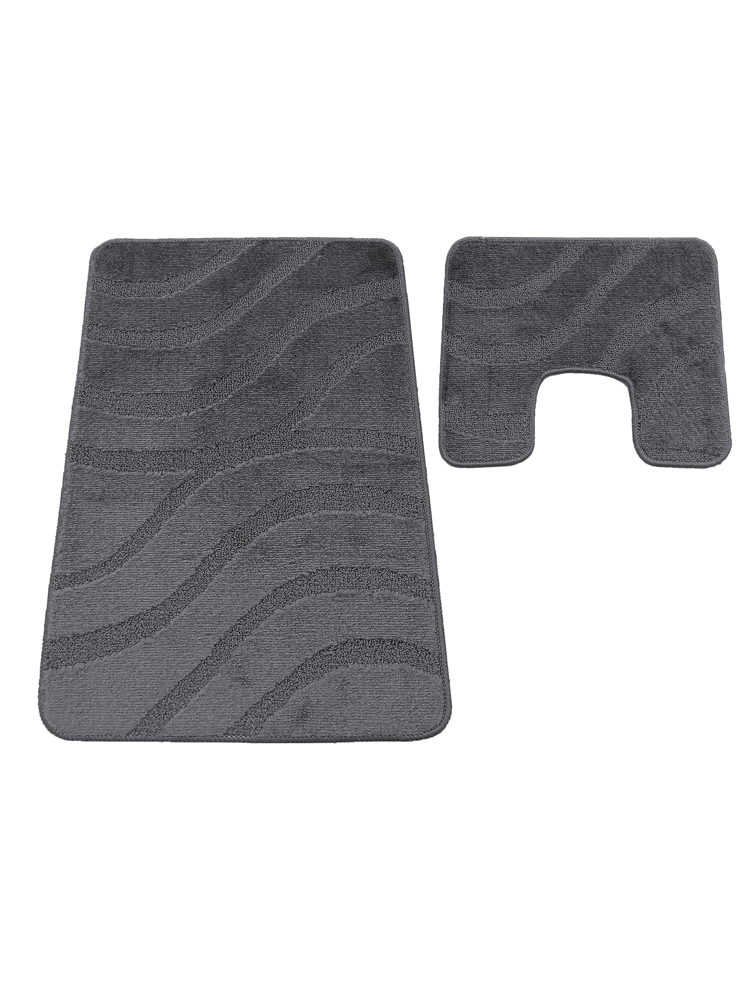 Deux tapis de salle de bain gris anthracite, avec des motifs de vagues texturées, l'un rectangulaire et l'autre en forme de U