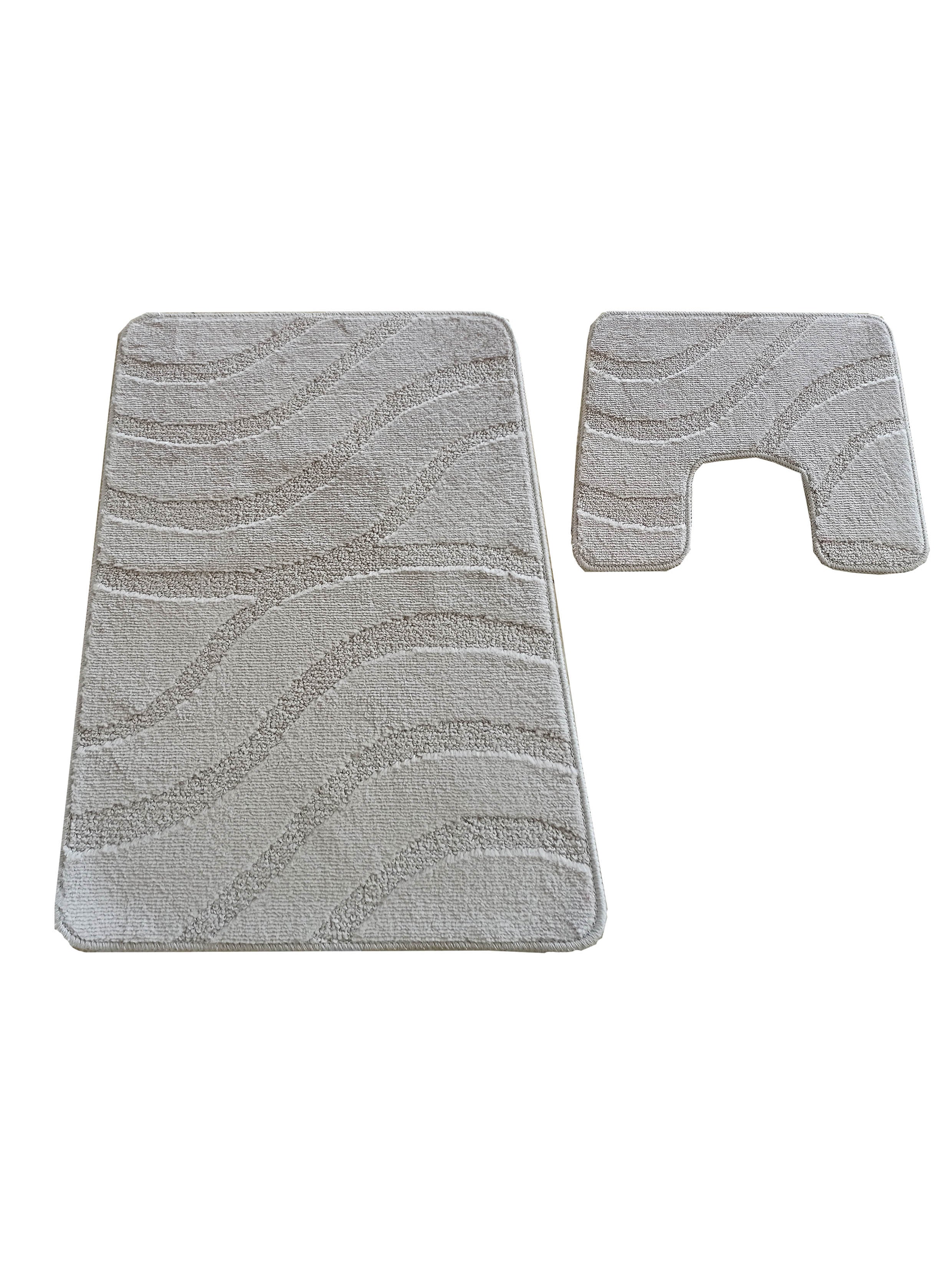 Deux tapis en textile beige clair avec des motifs ondulés en relief, un tapis rectangulaire et un tapis de contour