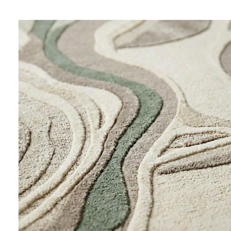 Texture de laine bouclée et coupée, bandes ondulantes beige, taupe et vert sauge en relief