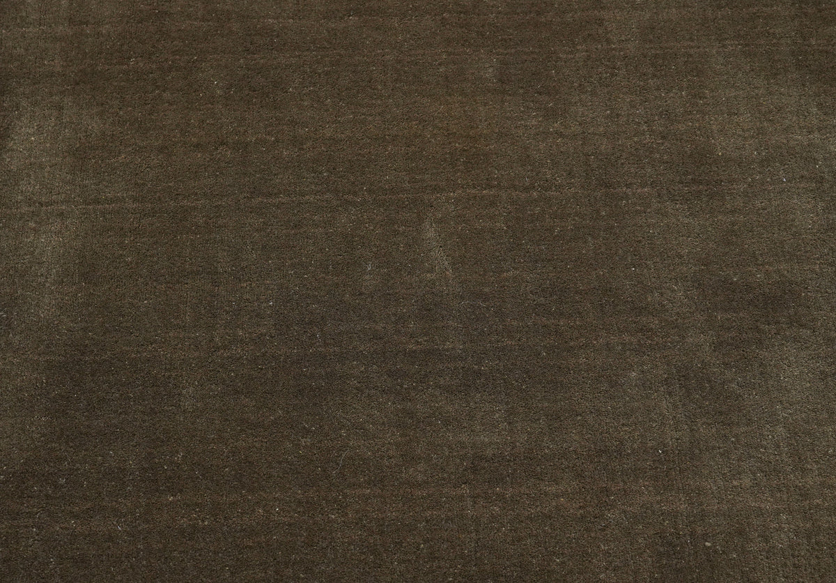 Les fibres de laine fait main offrent un velours brun foncé au relief délicat et texturé