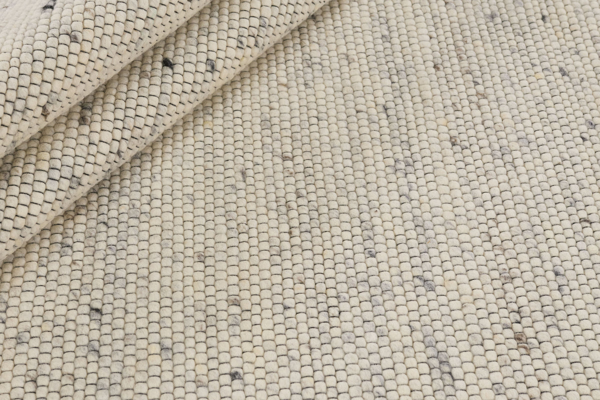 Tapis 100% Laine Écru - Grezzo, gros plan sur la texture
