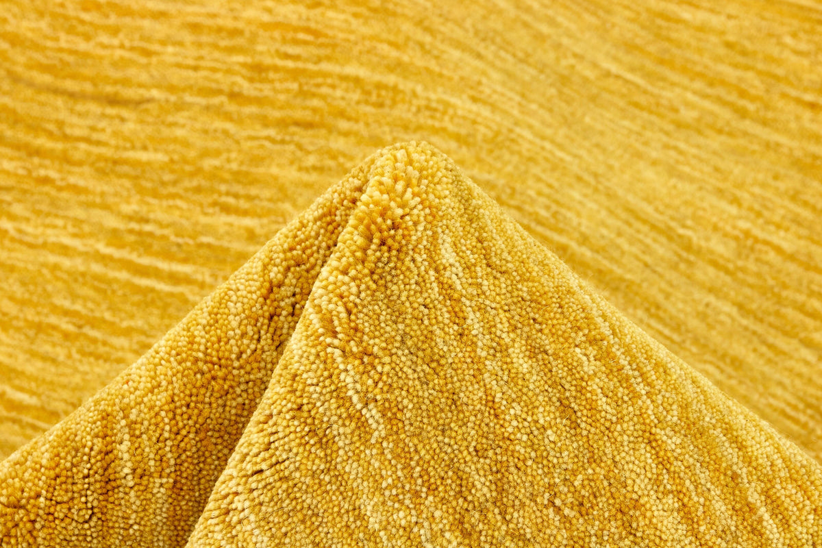 Saffron Yellow 100% Wool Rug - Filato, a closer look at the texture