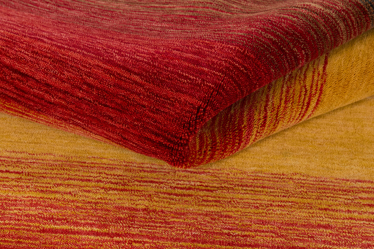 Wollteppich Orange & Rot - Tramonto, die Oberfläche aus der Nähe