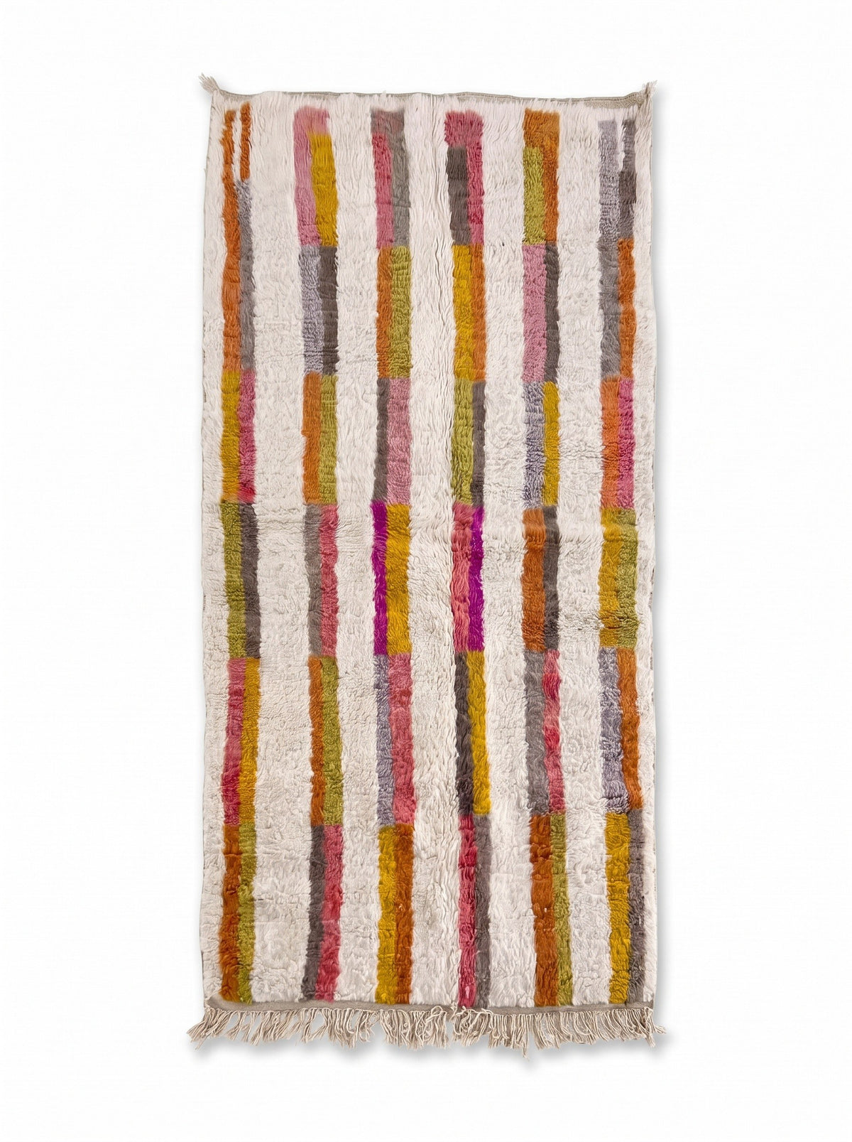 Fenzar Berber rug with multicolored stripes on white, laid flat, long pile on ecru, loose ecru fringes at the bottom only