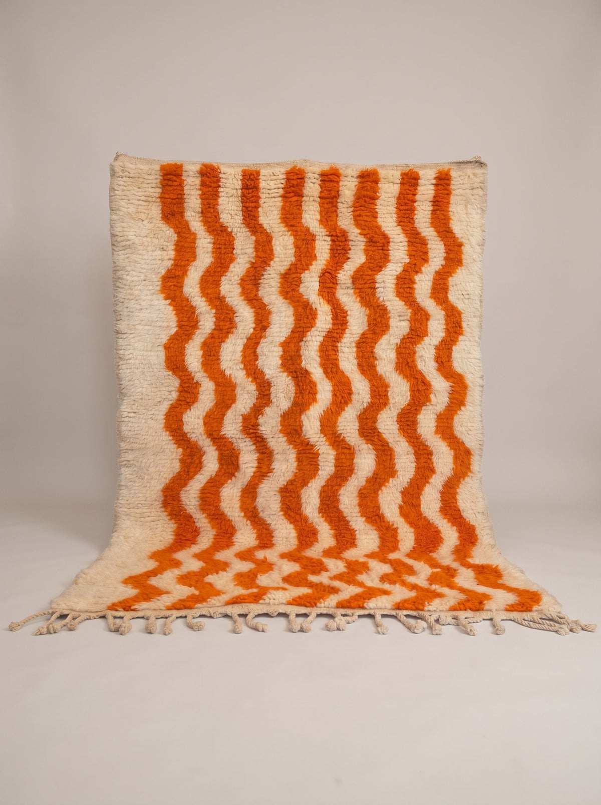 Imider striped Berber rug in orange and white, hanging, one of a kind, hand-knotted in Morocco