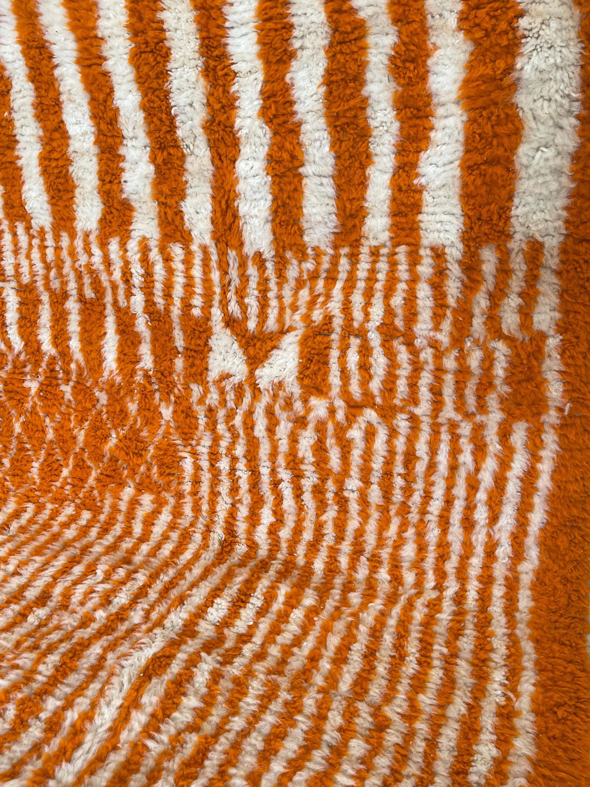 Close-up of the wool of the Iknioun Berber rug, tight knots and pattern lines seen up close