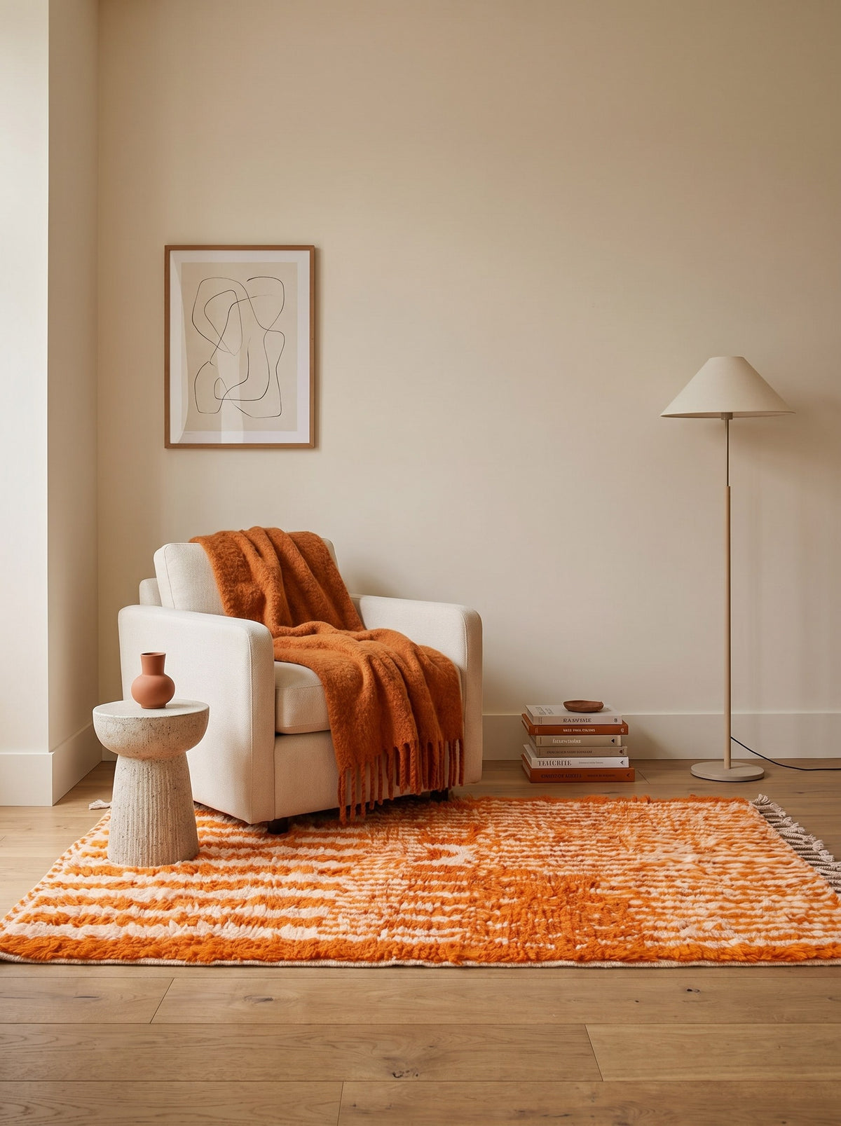 Iknioun Berber rug with orange stripes in a reading nook, hand-knotted in Morocco