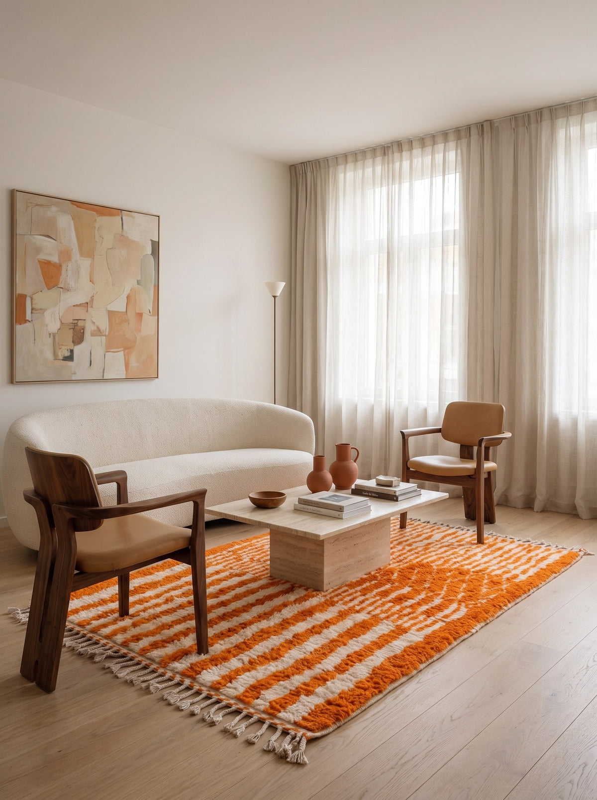 Iknioun Berber rug with orange stripes in a living room, hand-knotted in Morocco