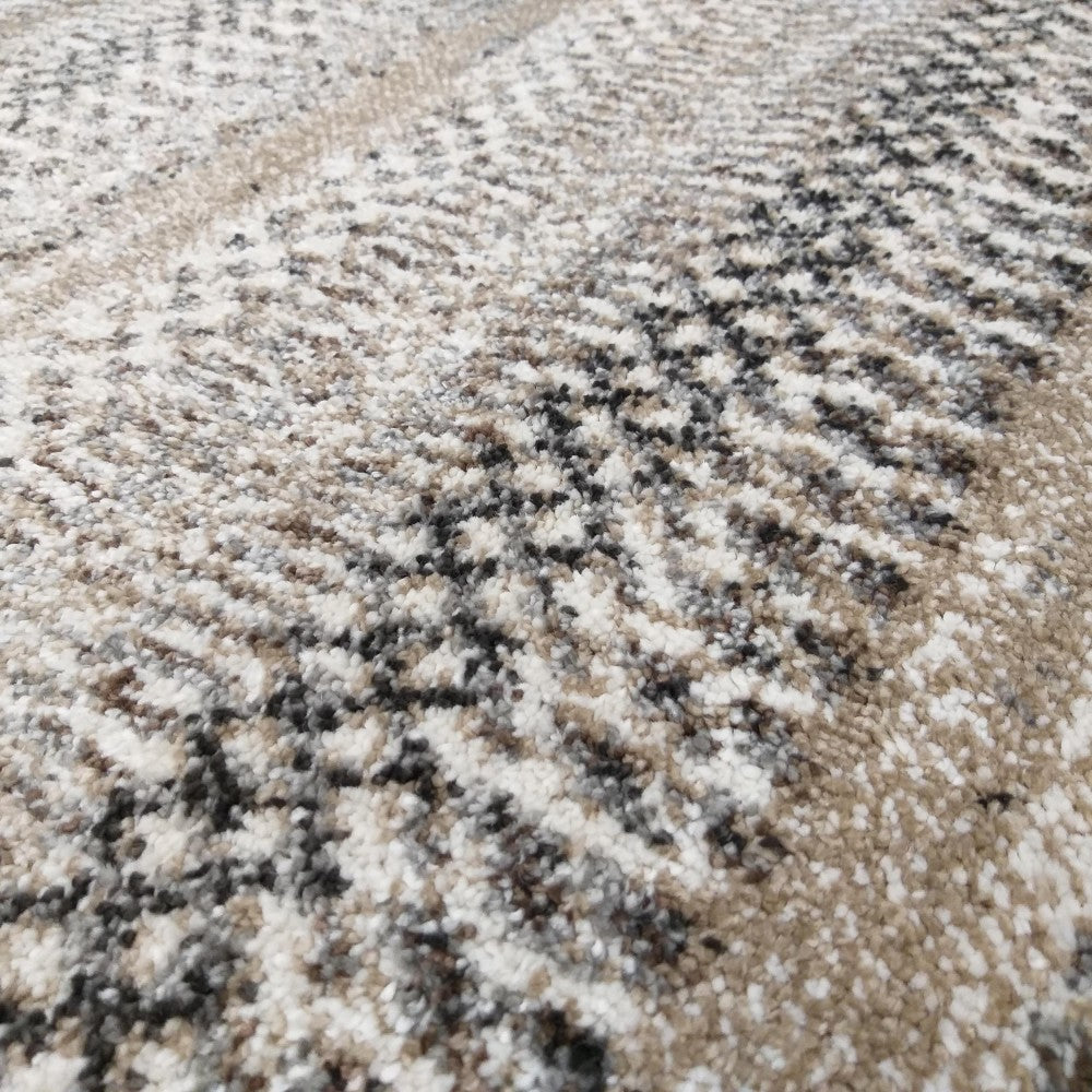 Tapis moelleux aux motifs abstraits et irréguliers, tissé avec des fils blancs, beiges et gris foncés