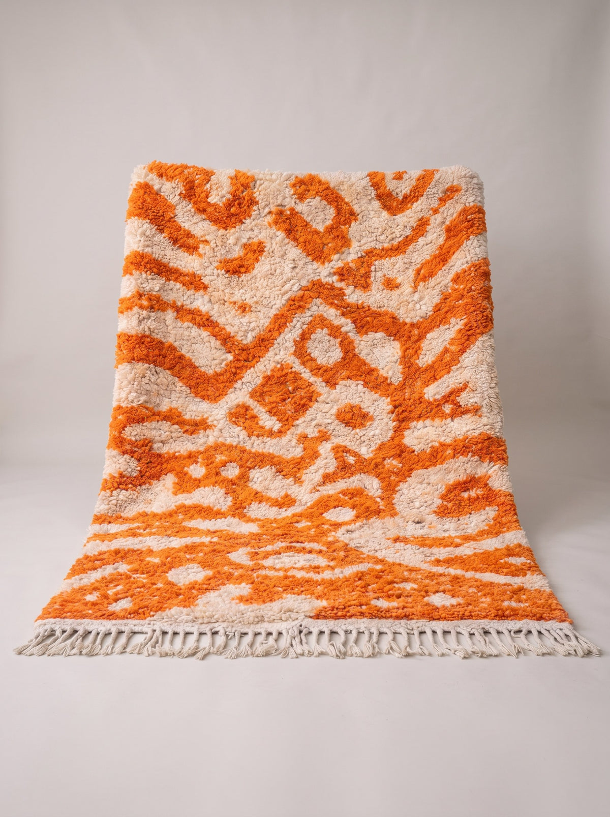 Todgha colourful Berber rug in orange and white, hanging, one of a kind, hand-knotted in Morocco
