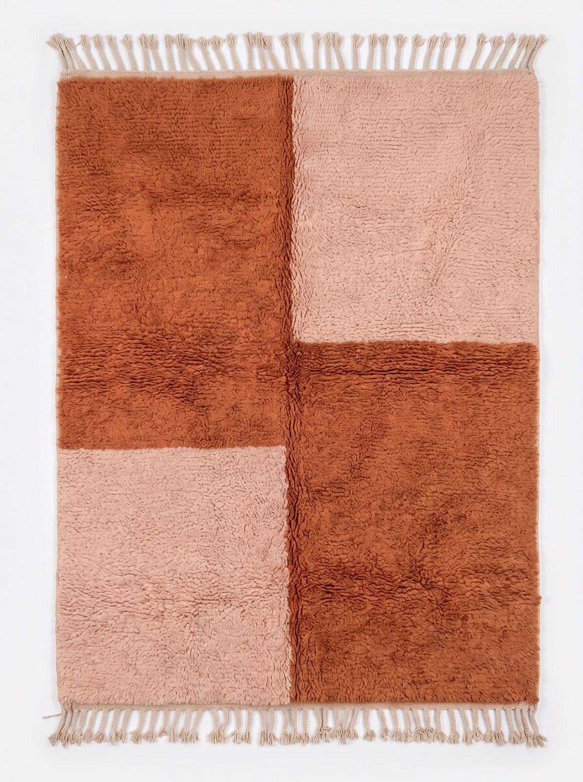 Pink and terracotta checkerboard Tamzoun Berber rug, laid flat, four large staggered long-pile blocks, ecru fringes