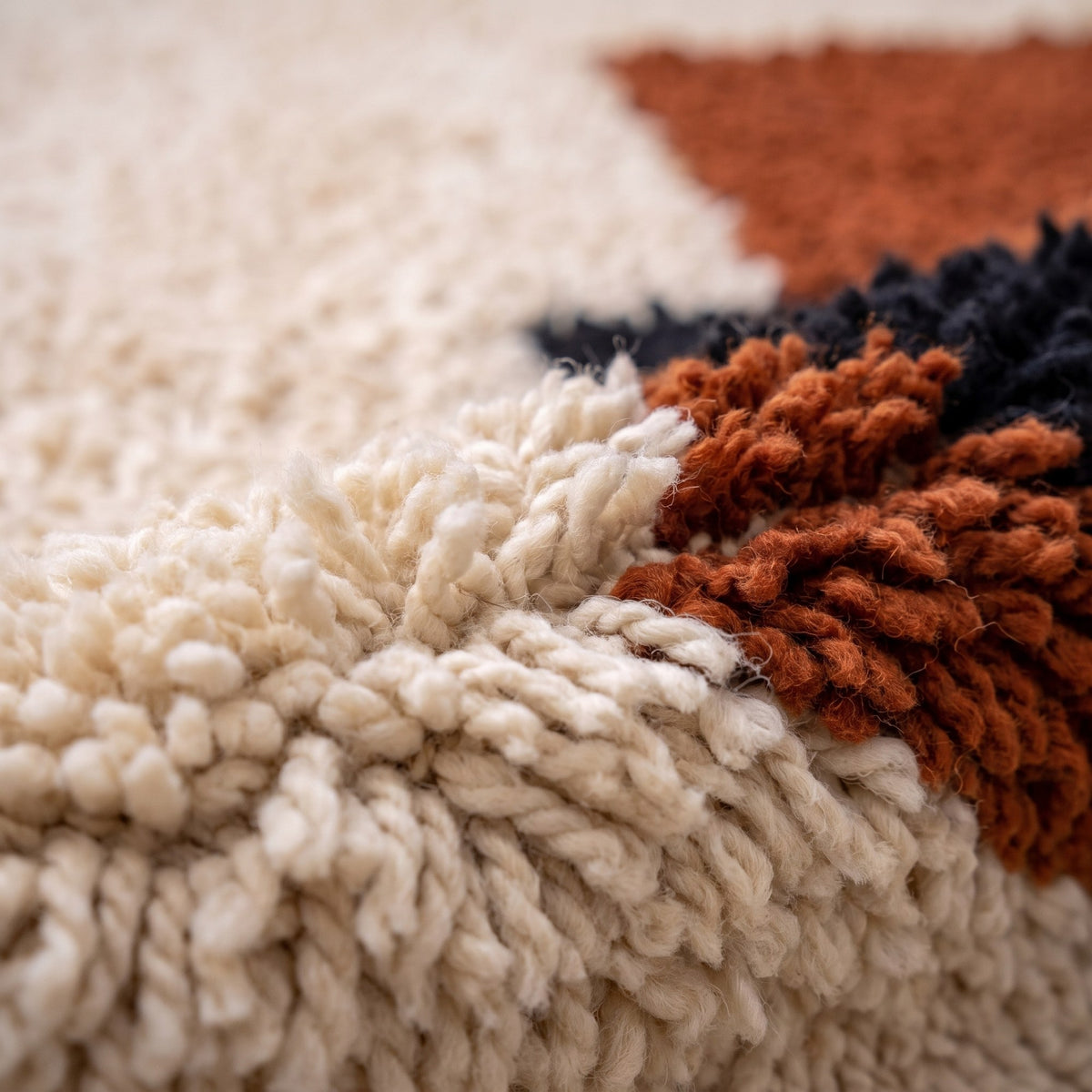 Close-up of a motif on the Meskala Berber rug, long-pile ecru field, at the top