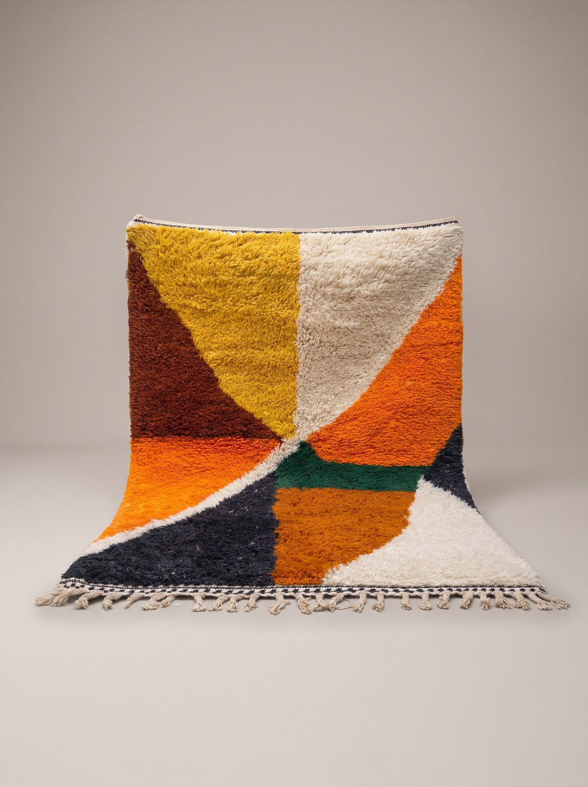 Amayas graphic Berber rug in orange and mustard, hanging, one of a kind, hand-knotted in Morocco