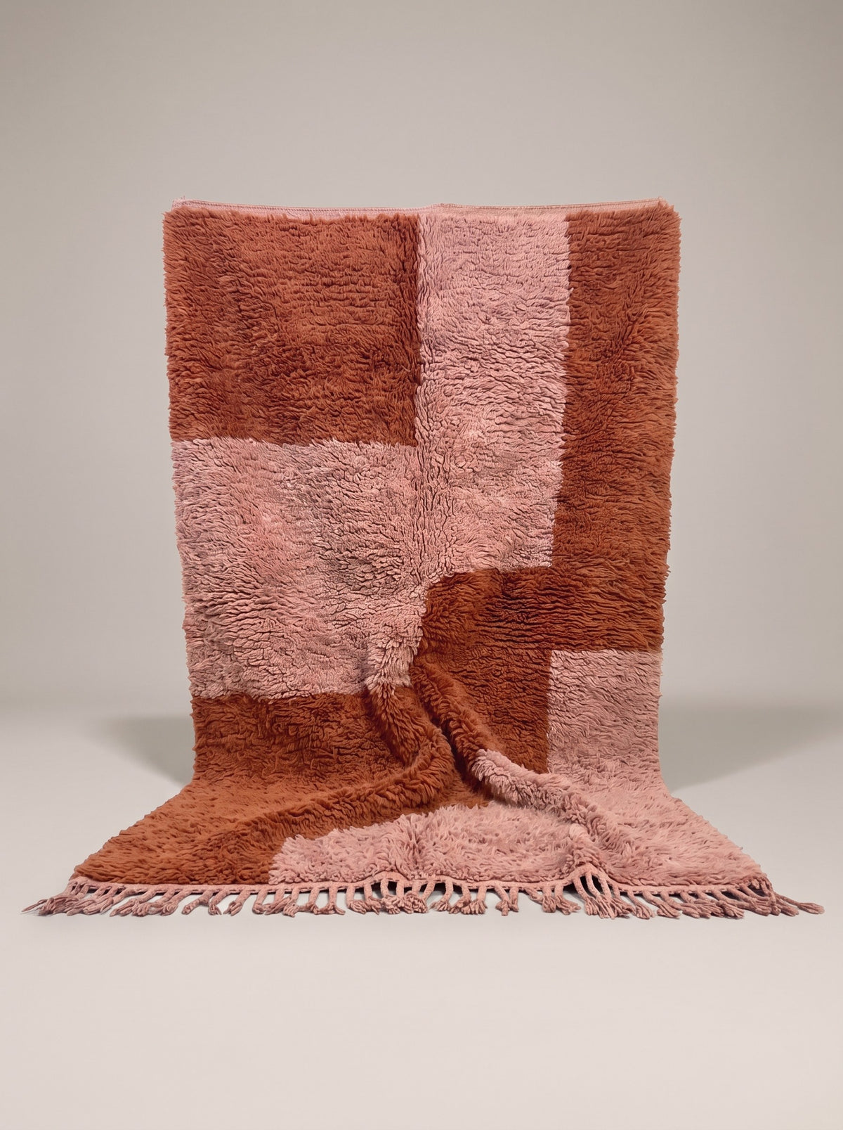 Tarmizt graphic Berber rug in terracotta and pink, hanging, one of a kind, hand-knotted in Morocco