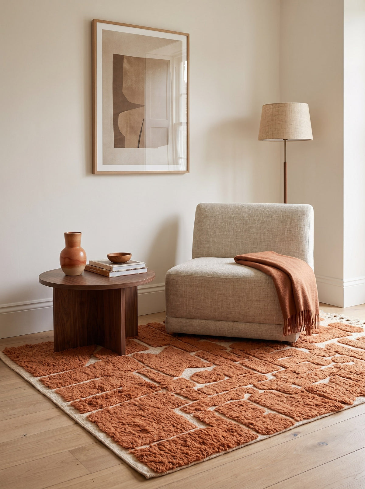 Graphic terracotta Tinmel Berber rug in a reading nook, hand-knotted in Morocco