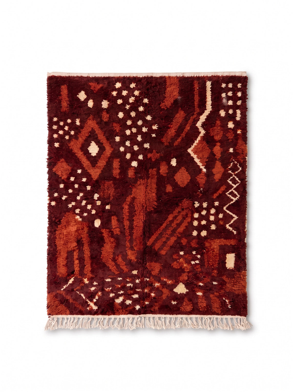 Tapis berbère style Boujad bordeaux Imzad vu à plat, losange rouille à cœur écru en haut, franges écrues en bas seulement