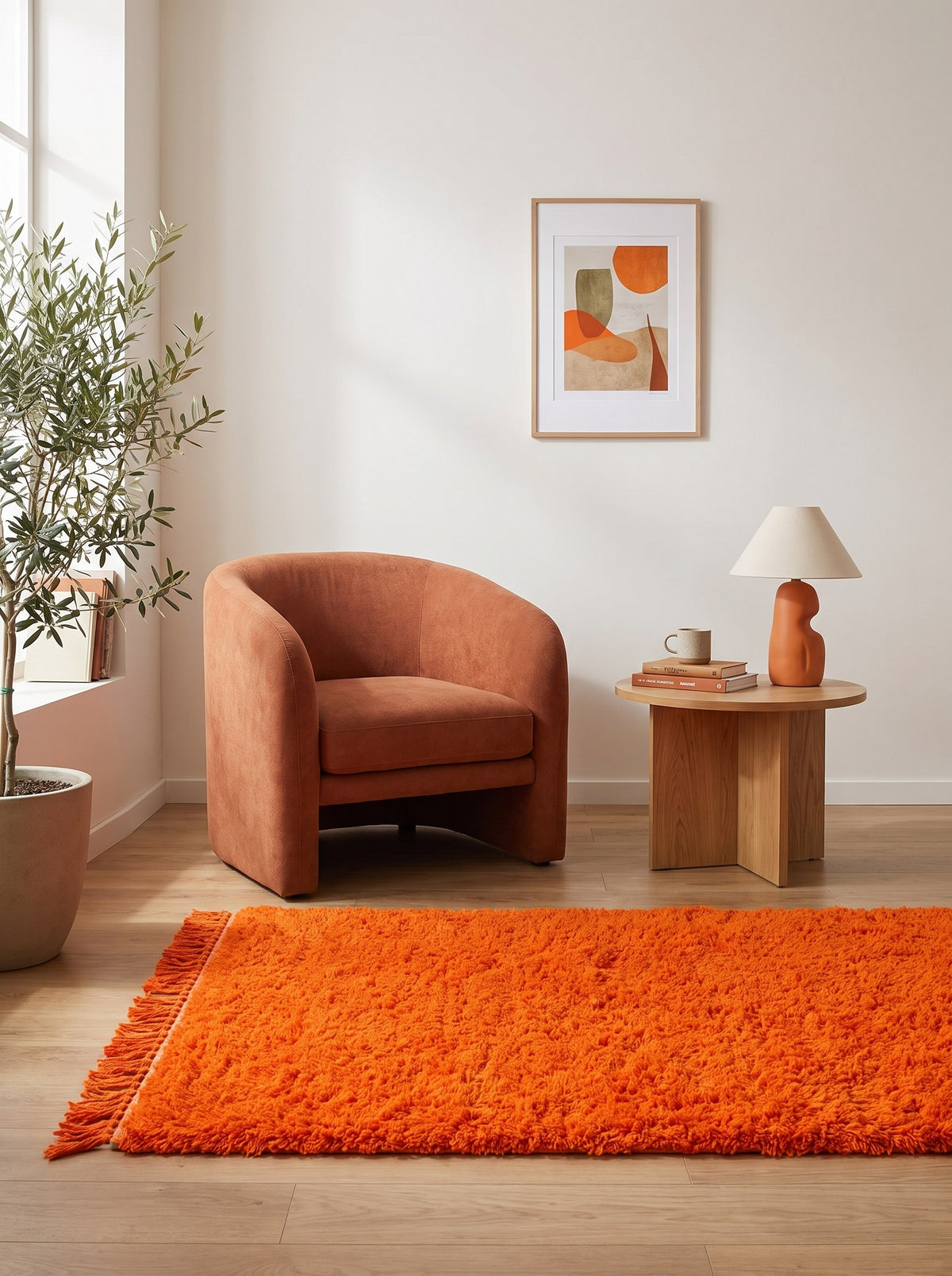 Merzouga plain orange Berber rug in a reading nook, hand-knotted in Morocco
