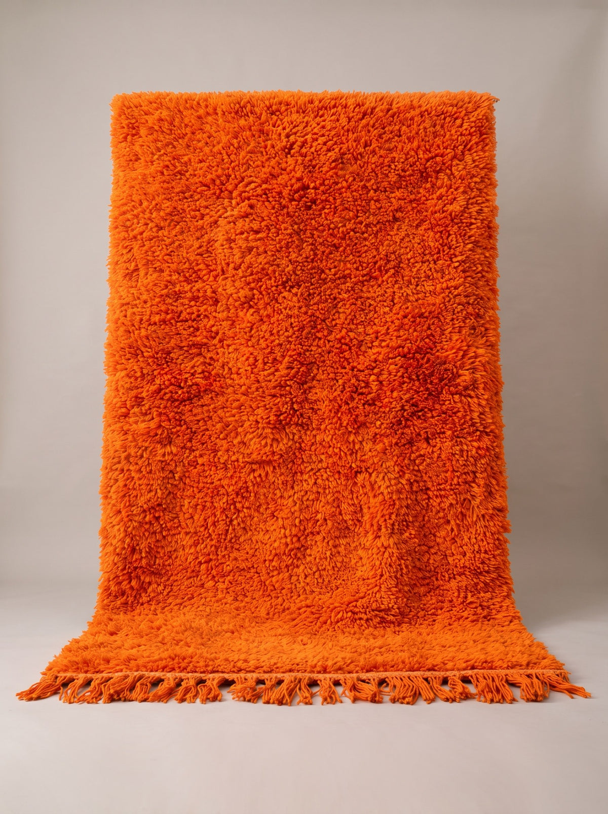 Merzouga plain orange Berber rug, hanging, one of a kind, hand-knotted in Morocco