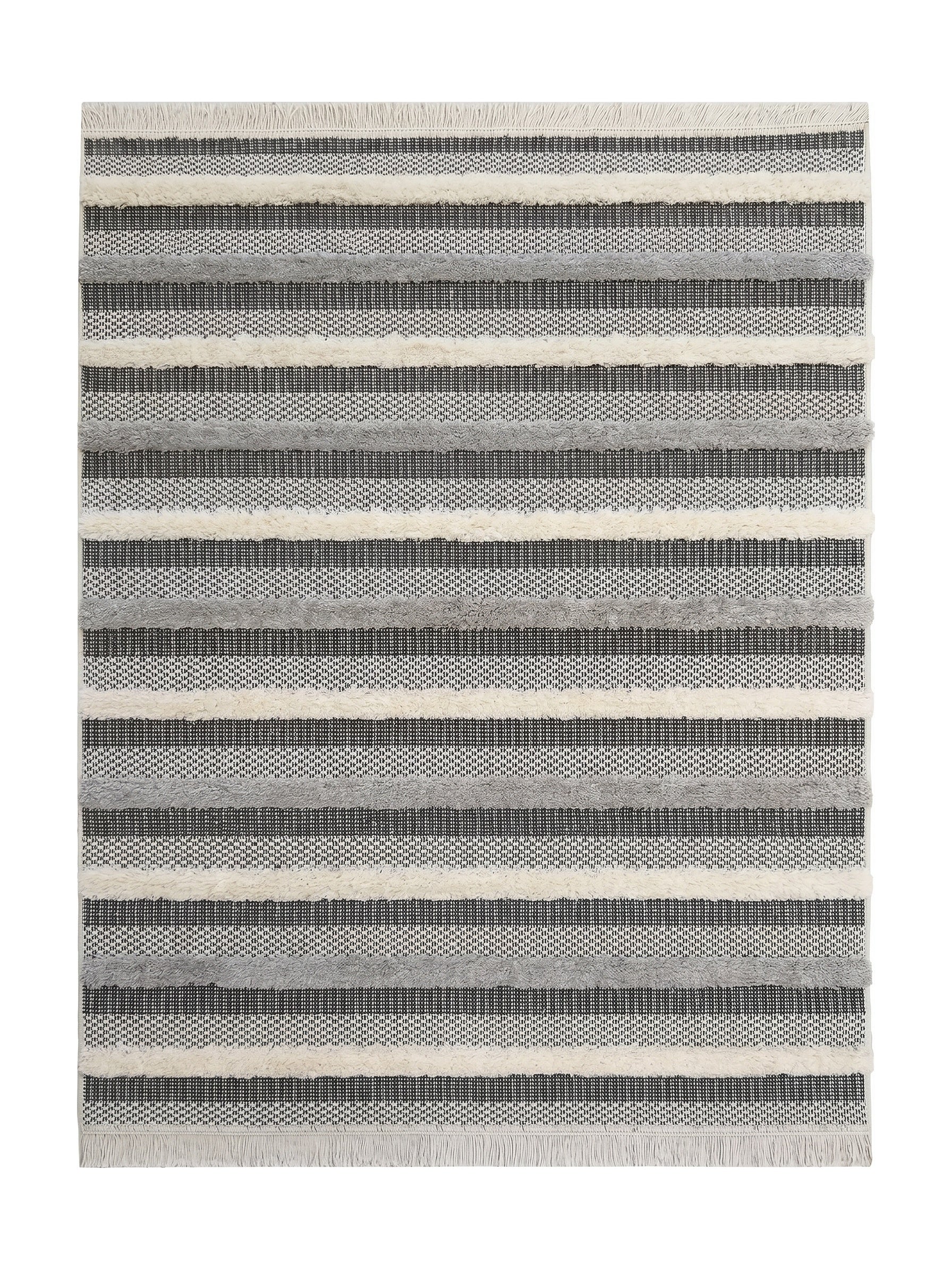 Tapis rectangulaire à rayures horizontales crème, gris clair et gris foncé, alternant textures tissées et moelleuses, avec franges