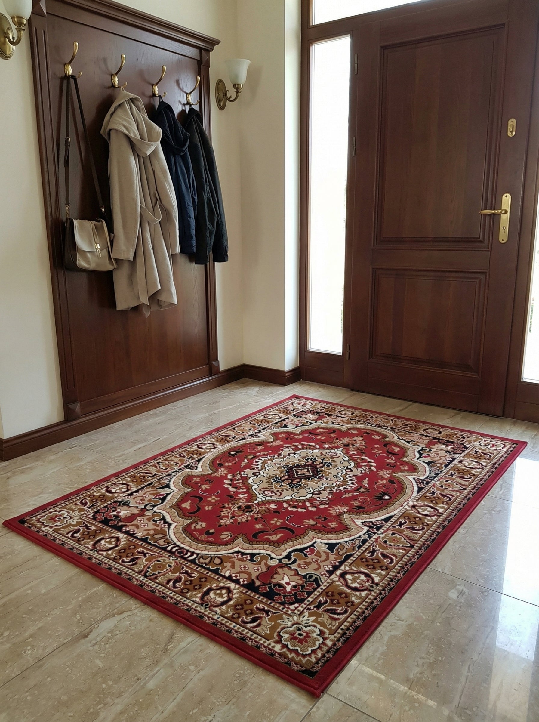 Tapis rouge bordeaux avec de riches motifs floraux et un médaillon central crème, marron et noir, posé dans une entrée