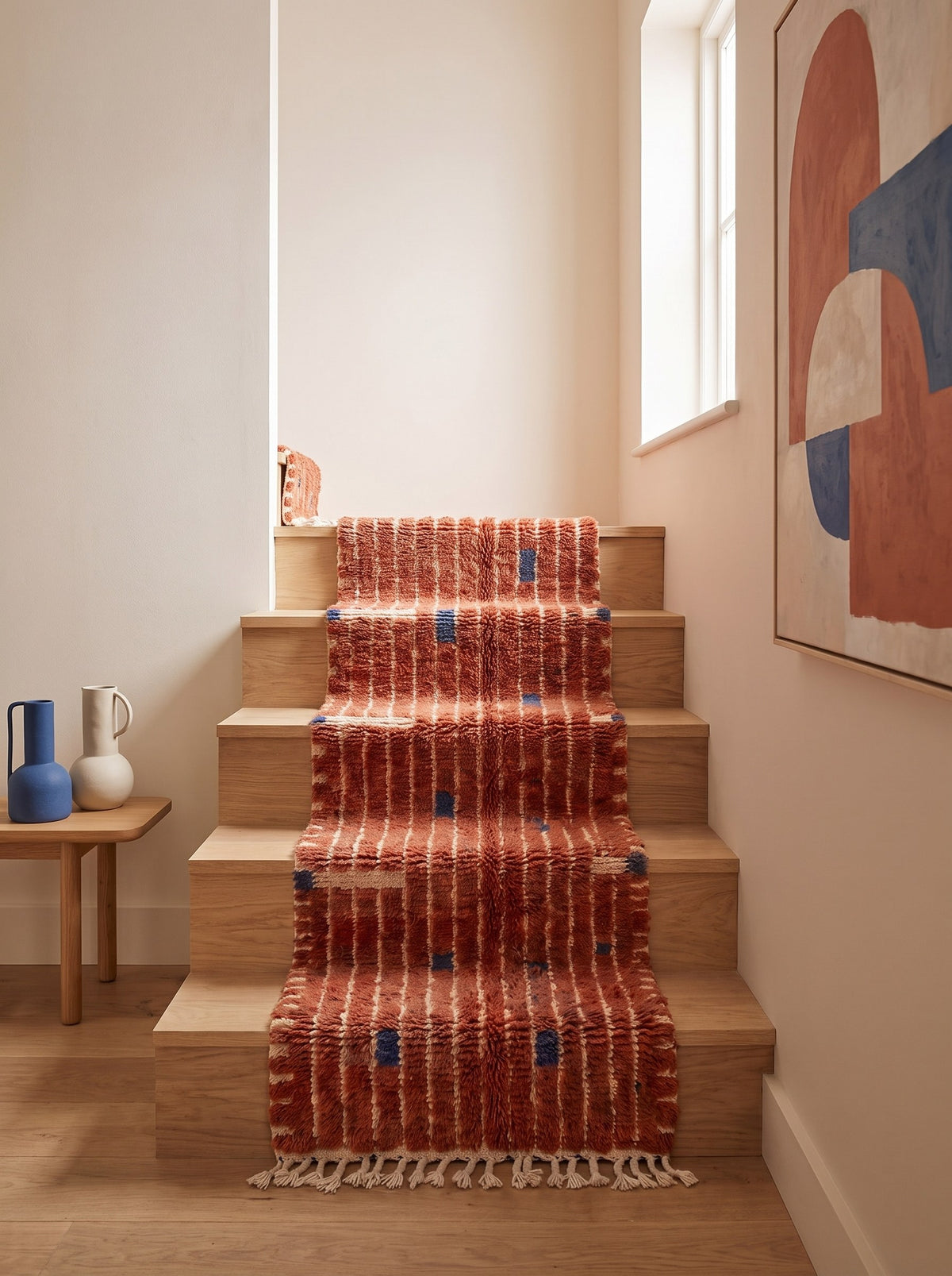 Tichka Berber stair runner with terracotta stripes on a third staircase, hand-knotted in Morocco