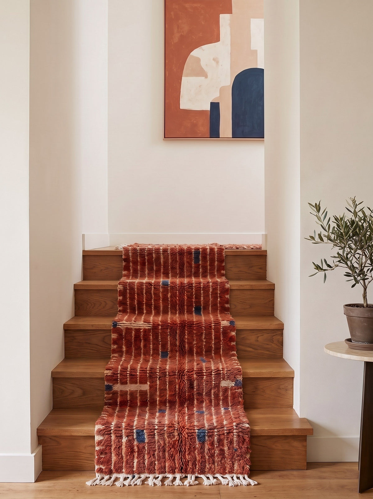 Tichka Berber stair runner with terracotta stripes on a staircase, hand-knotted in Morocco