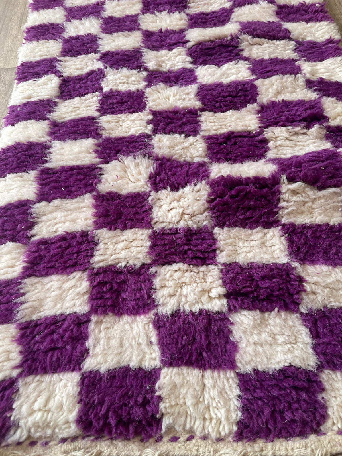Close-up of a detail on the Zerrouka Berber stair runner, shades of the wool and pattern seen up close