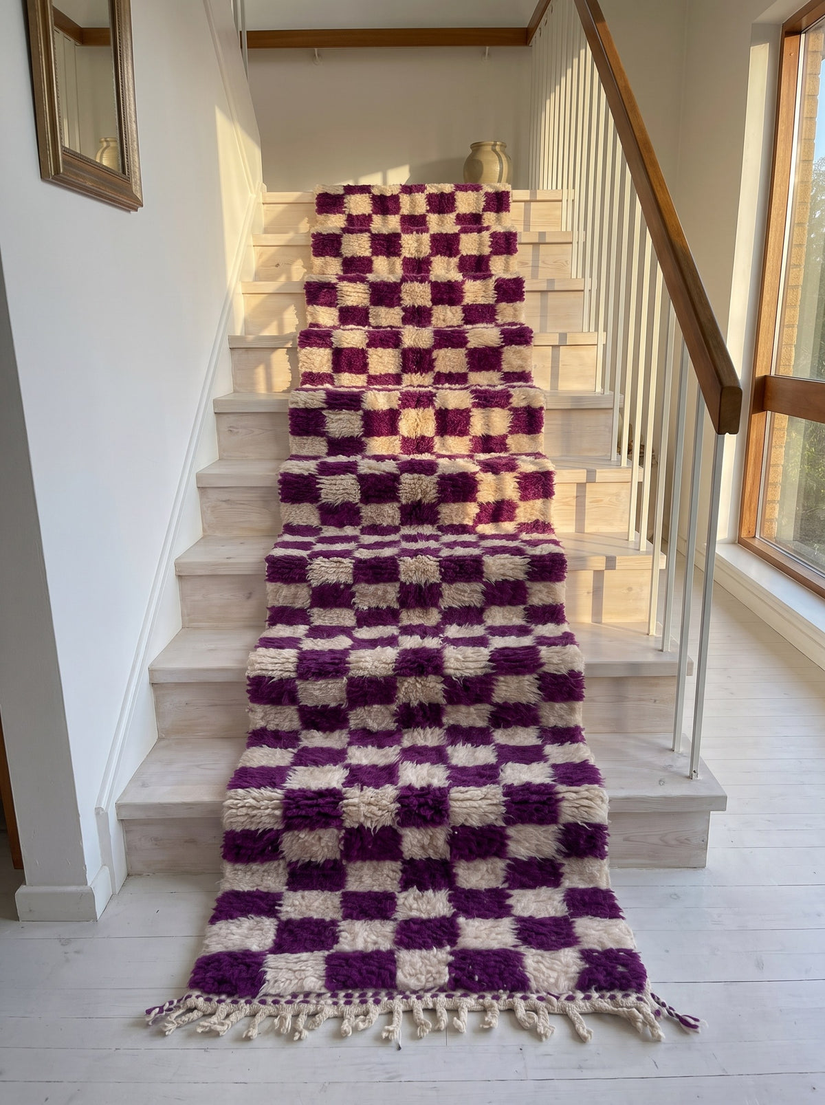 Zerrouka Berber stair runner with a purple checkerboard pattern, on another staircase, hand-knotted in Morocco
