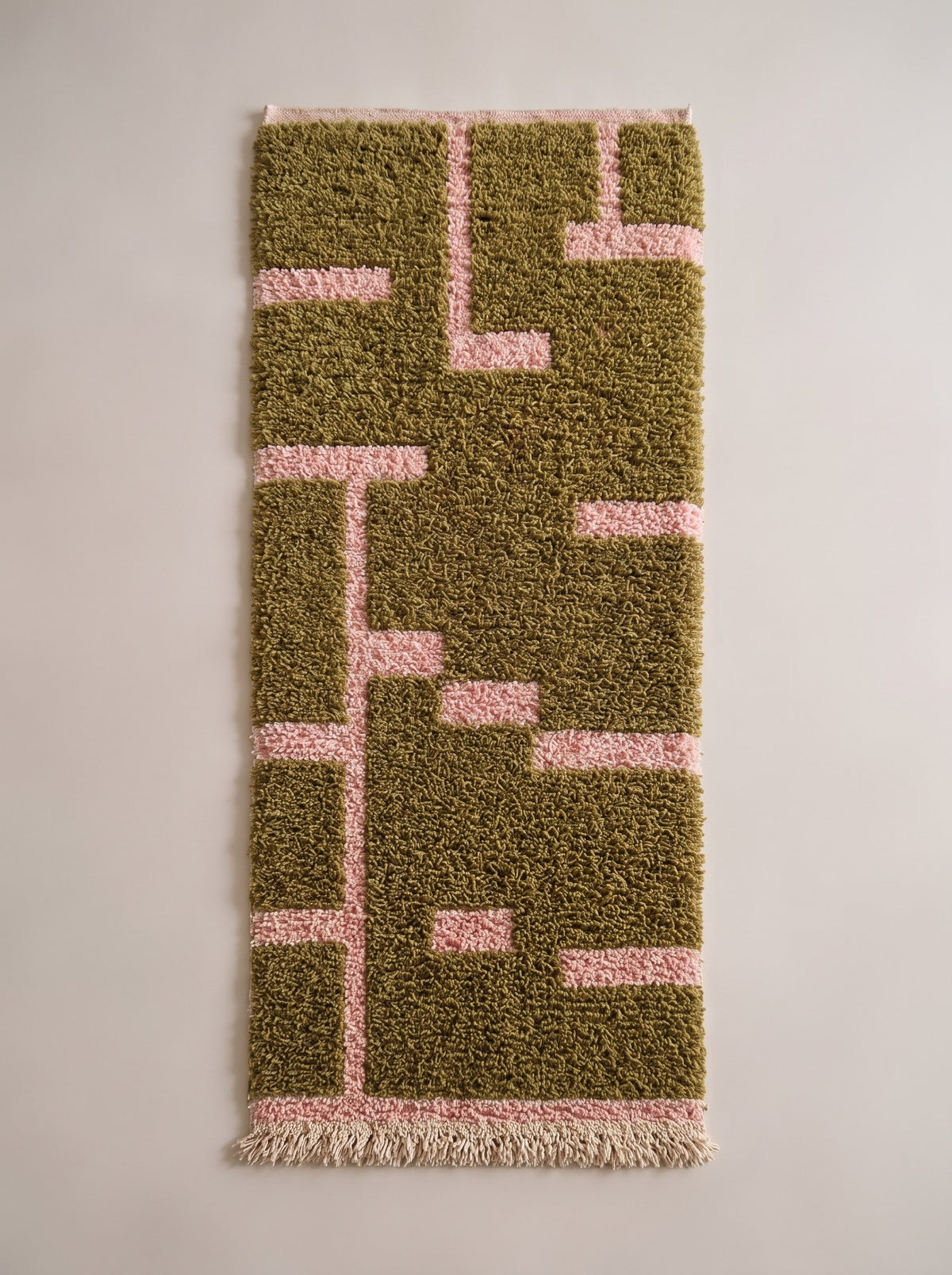 Bougmez Berber stair runner, graphic, in olive green and pink, laid flat, olive green runner with dense pile, ecru fringes
