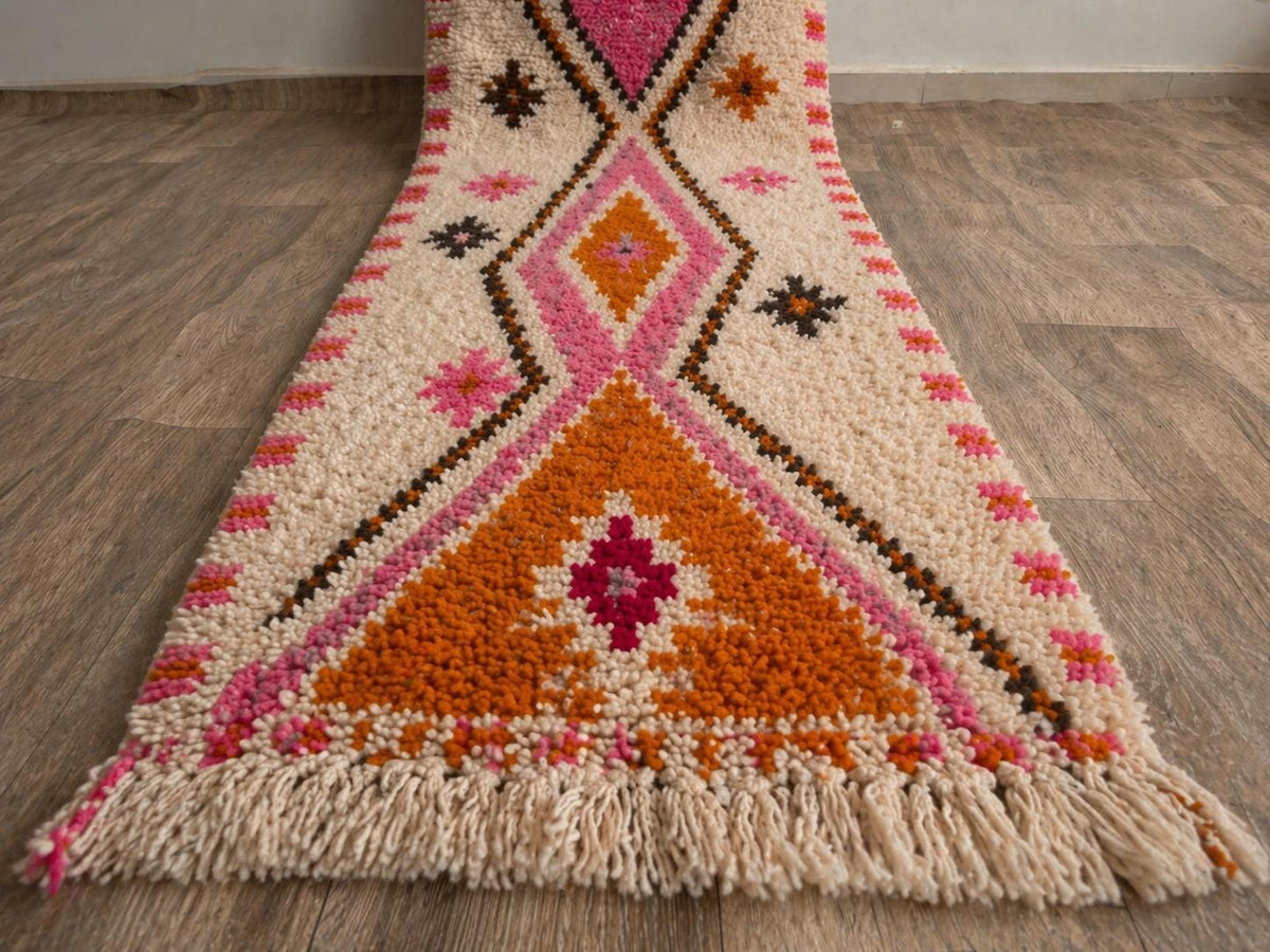 Close-up of the fringes on the Tifawin Berber stair runner, ecru, knotted by hand
