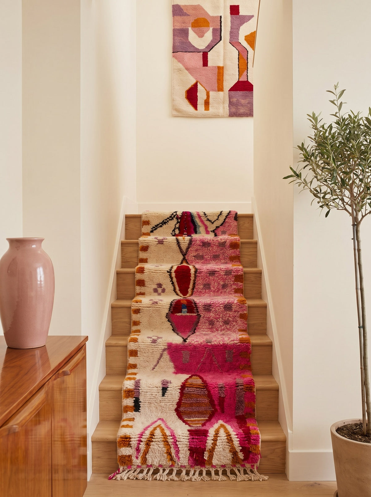 Ameln Berber stair runner, Azilal style, in pink and white, on a staircase, hand-knotted in Morocco