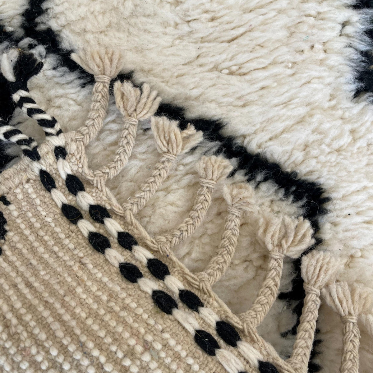 Close-up of the back of the Kandar Berber stair runner, knots visible on the cotton warp, no backing