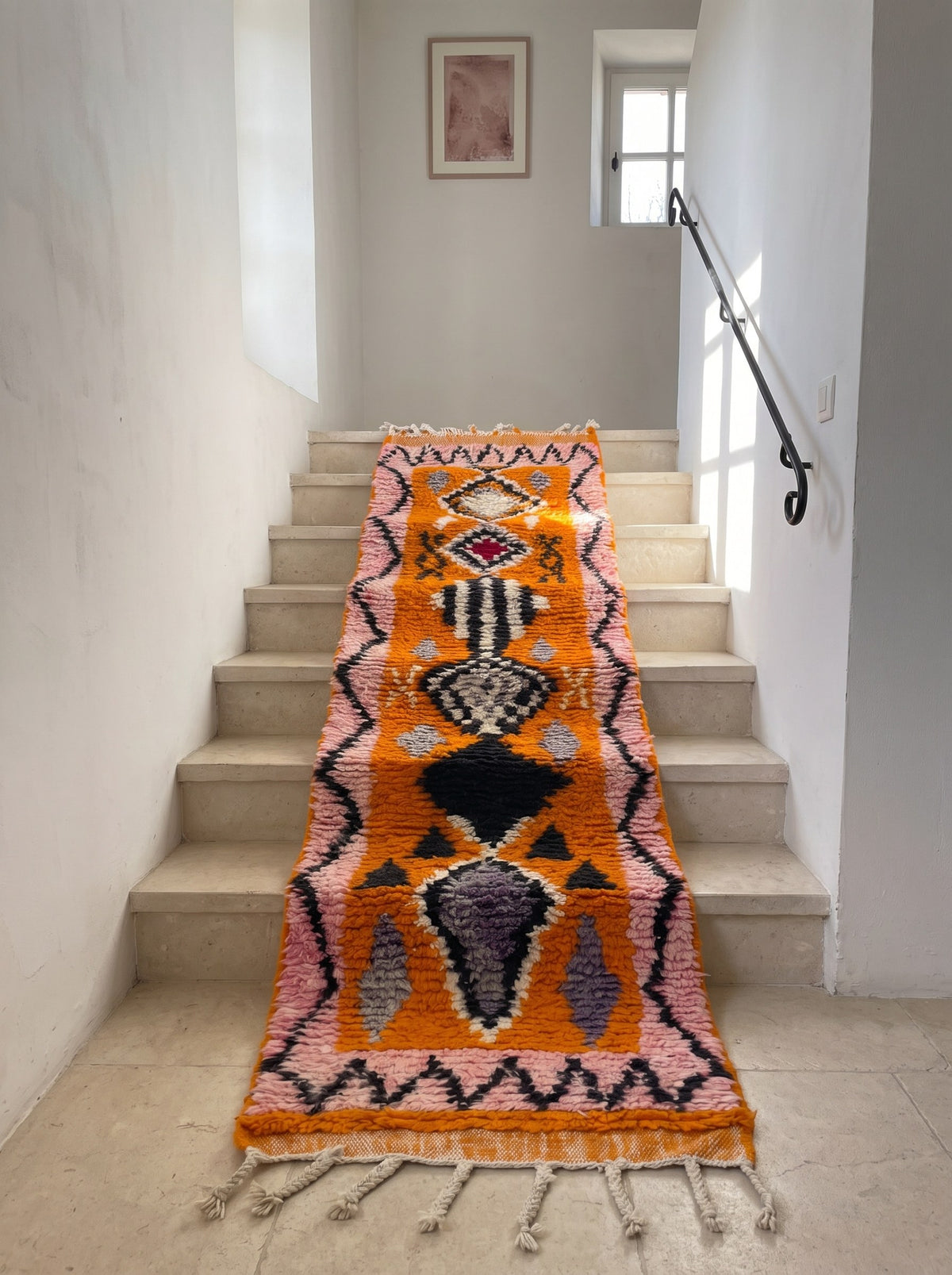 Khamlia Berber stair runner, Boujad style, in orange and pink, on another staircase, hand-knotted in Morocco