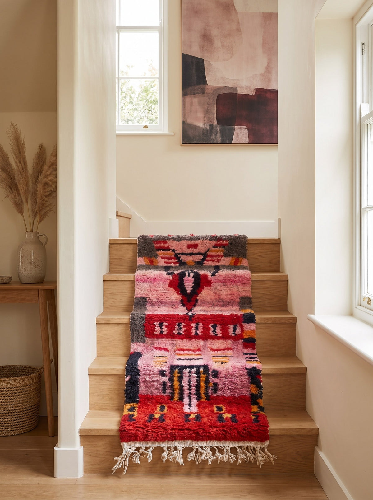 Imilchil Berber stair runner, Boujad style, in pink and red, on a third staircase, hand-knotted in Morocco