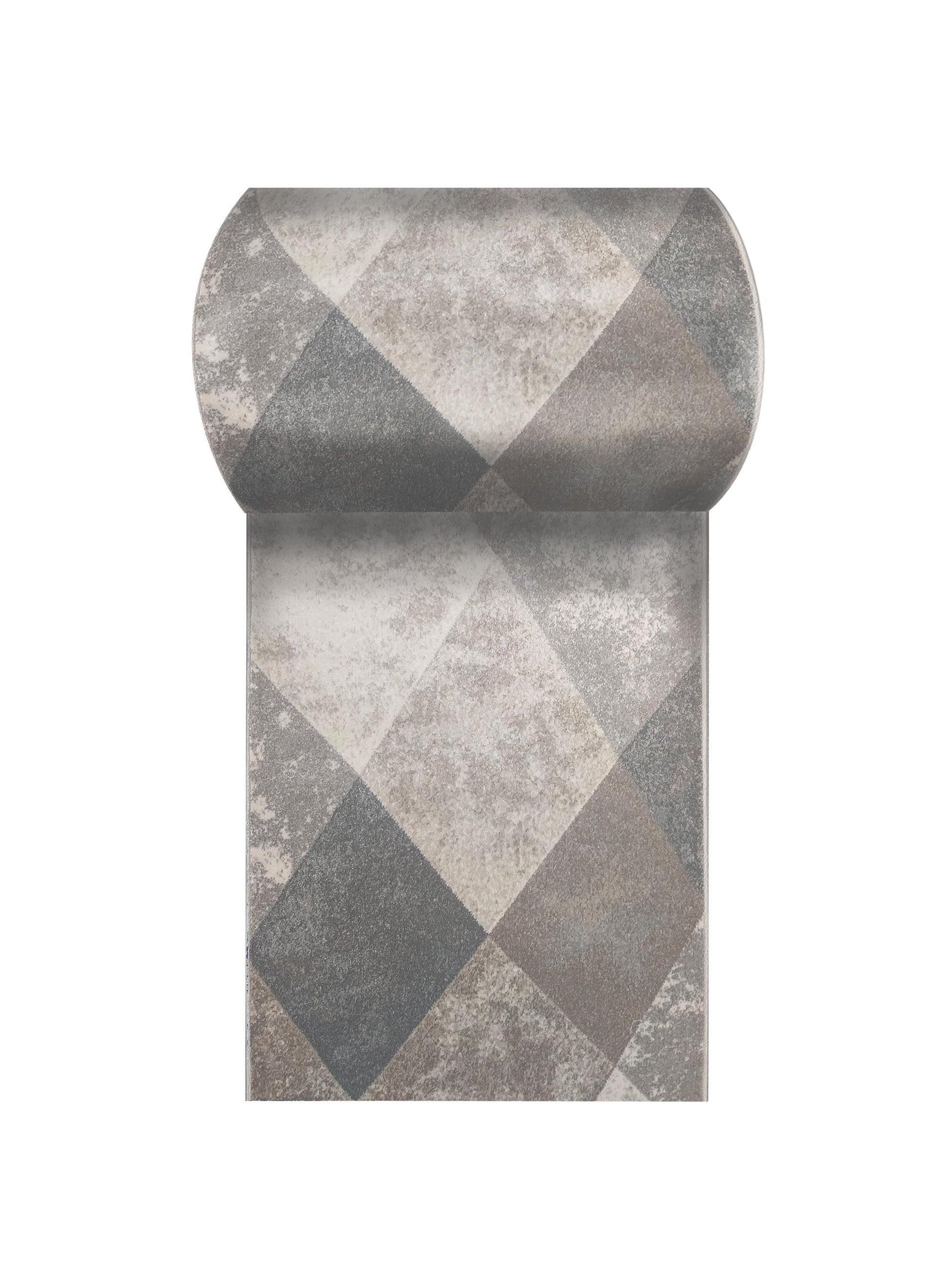 Tapis enroulé à motifs de losanges gris et beiges, avec une texture textile chinée visible