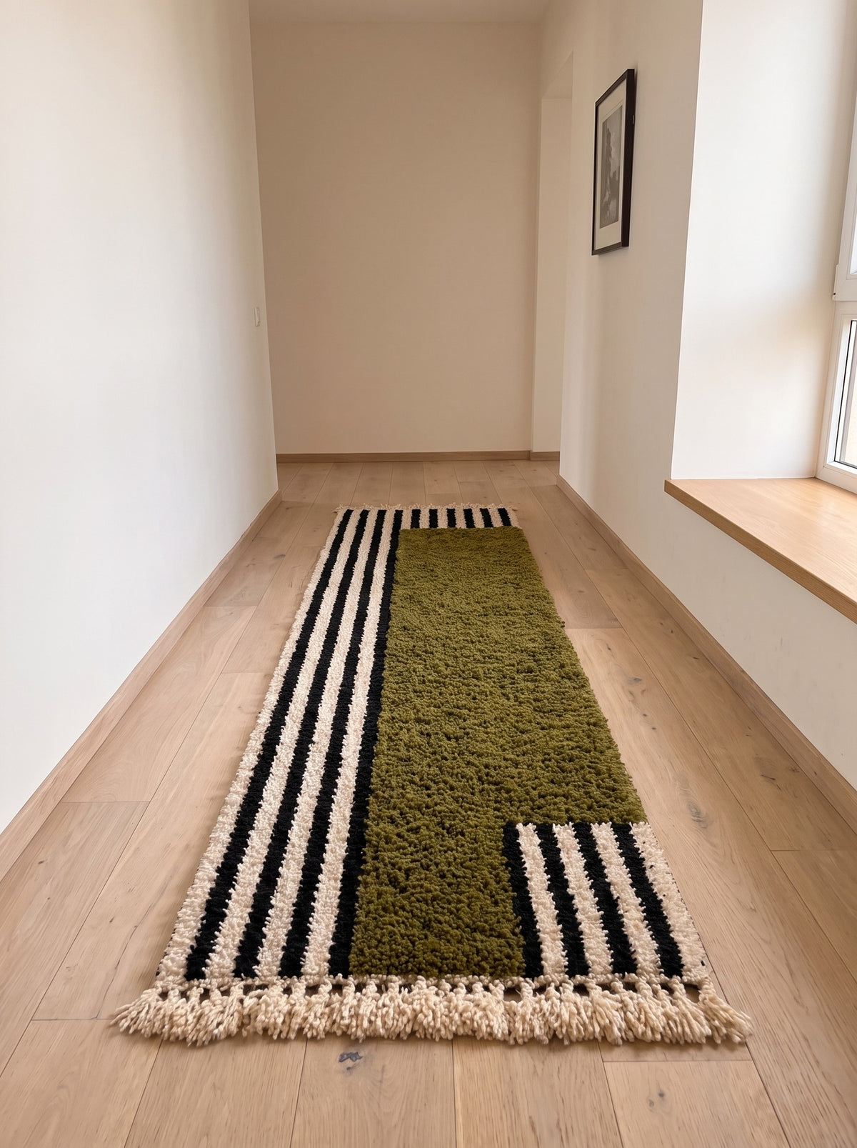 Tanuwar Berber runner with olive green stripes in a third hallway, hand-knotted in Morocco