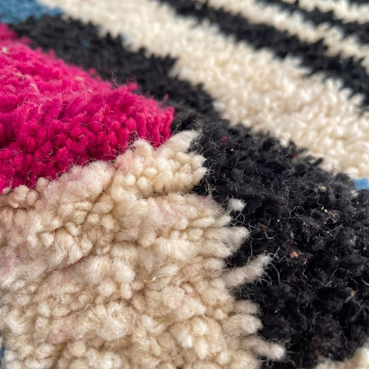 Close-up of a motif on the Legzira Berber runner, runner shape, upper half in vertical burgundy blocks