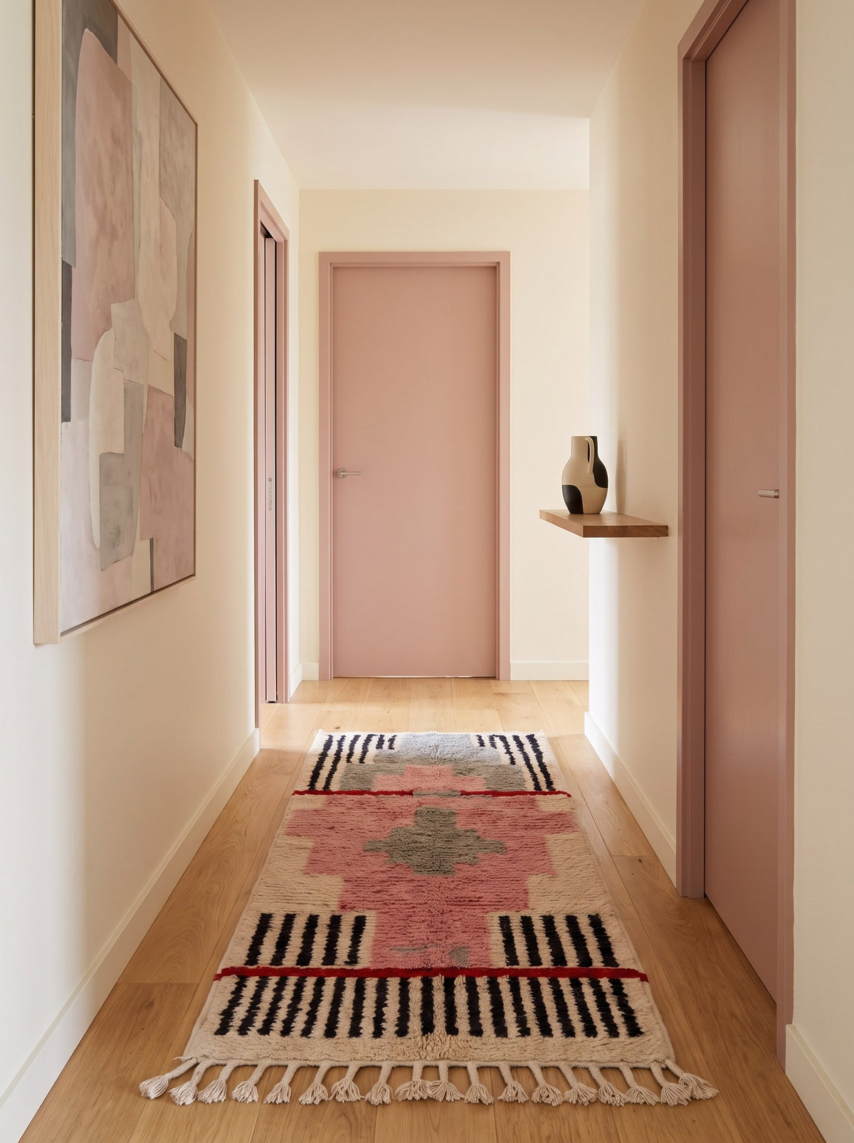 Timzila graphic Berber runner in pink and grey, in a third hallway, hand-knotted in Morocco