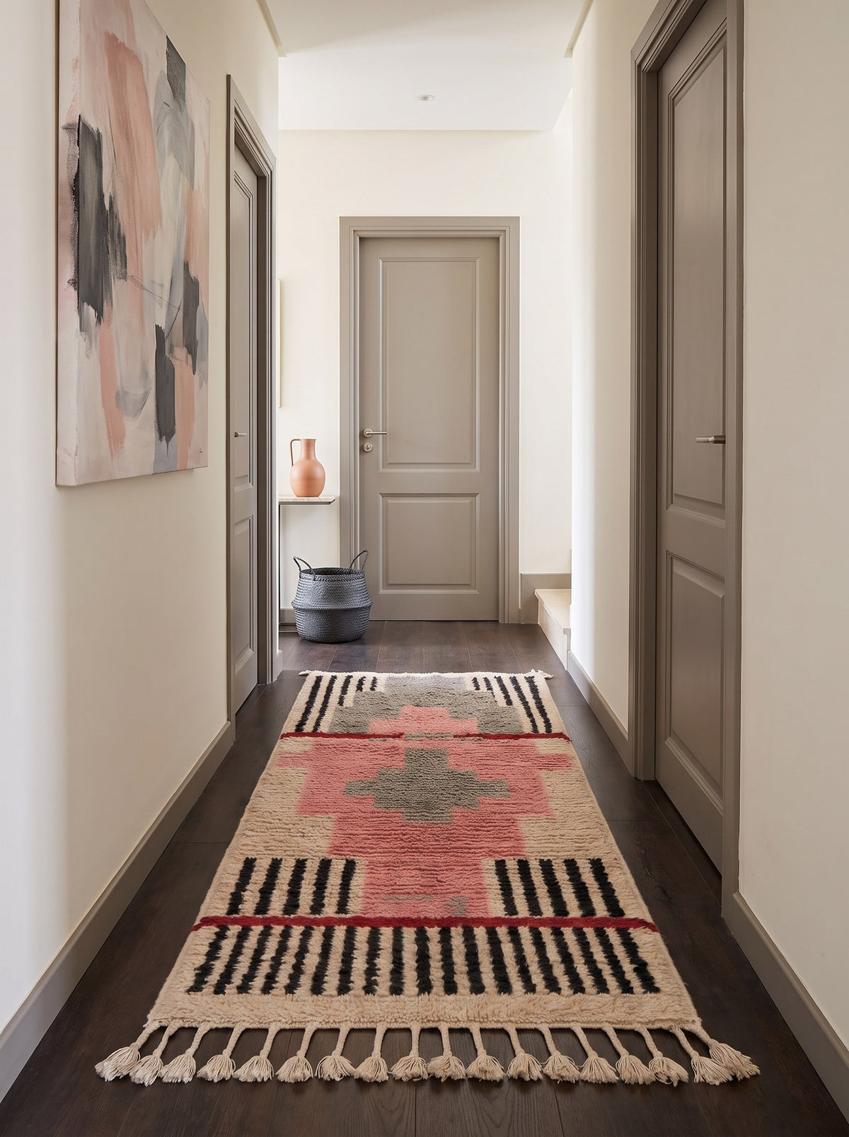 Timzila graphic Berber runner in pink and grey, in a hallway, hand-knotted in Morocco