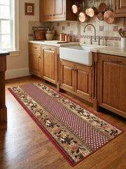 Tapis de couloir en textile rouge et beige, orné de motifs floraux complexes et d'une bande centrale géométrique sur parquet de cuisine