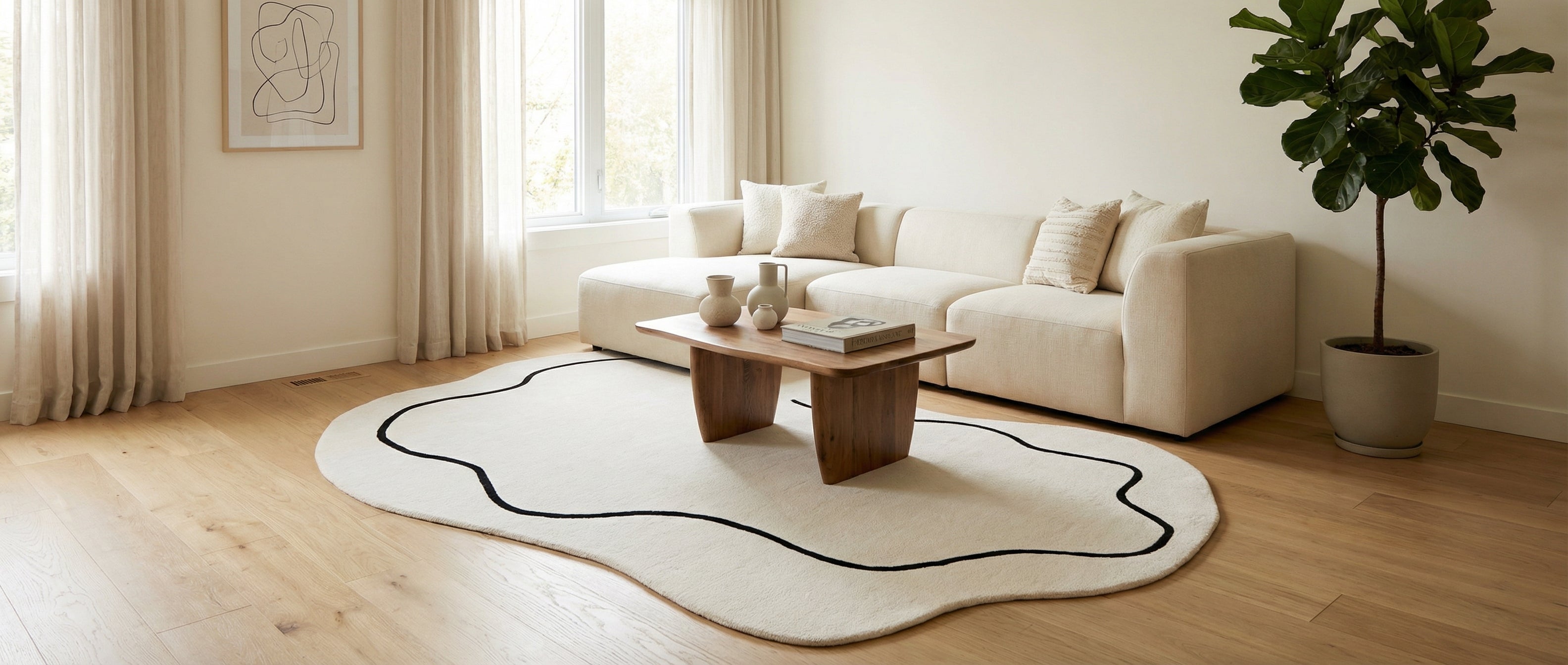Pièce transformée par le type de tapis rond/ovale, couleur ivoire, bordure noire