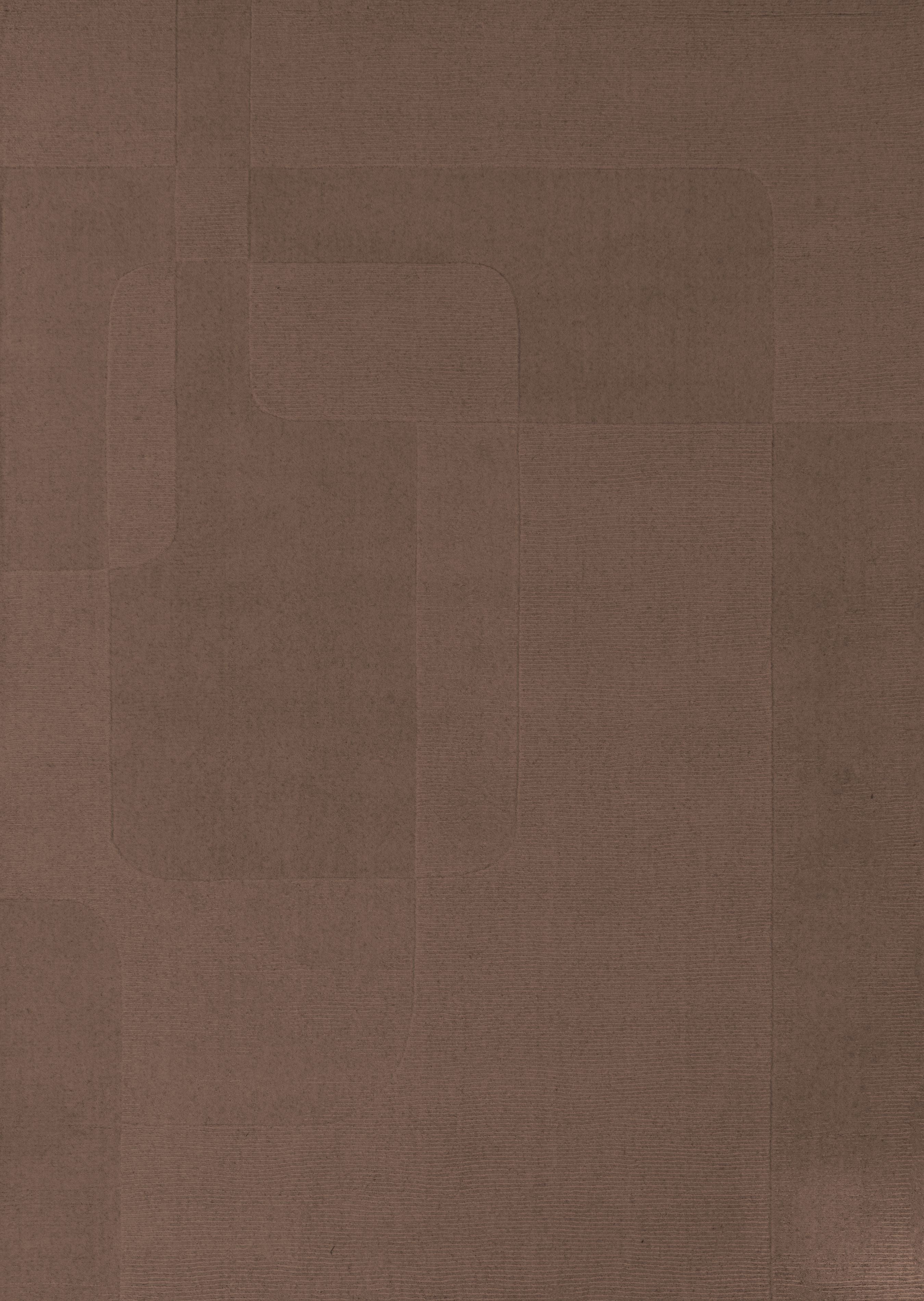 Tapis rectangulaire marron avec motif géométrique, ambiance chaleureuse