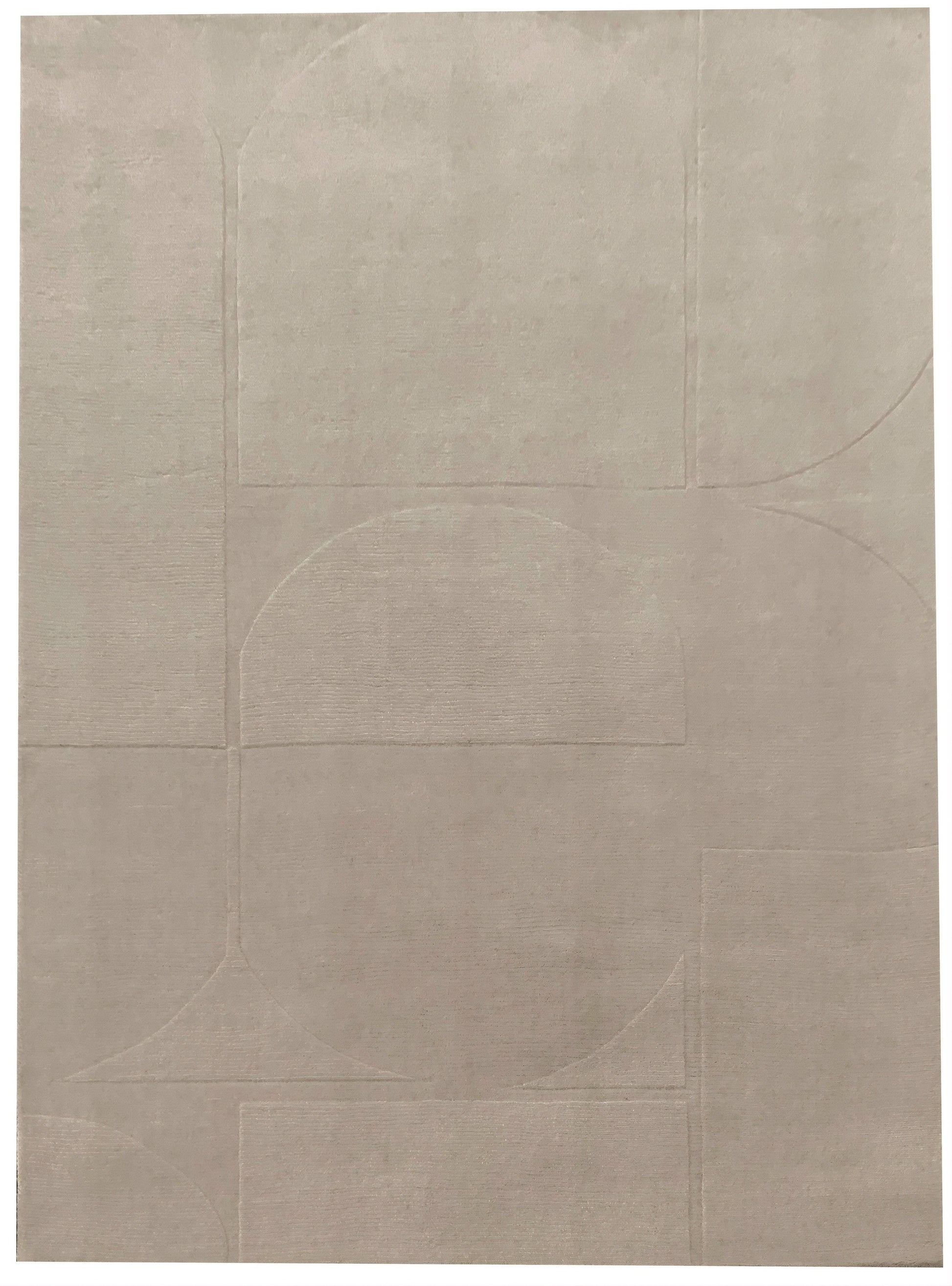 Tapis rectangulaire ivoire avec motif géométrique abstrait. Style contemporain, ambiance épurée