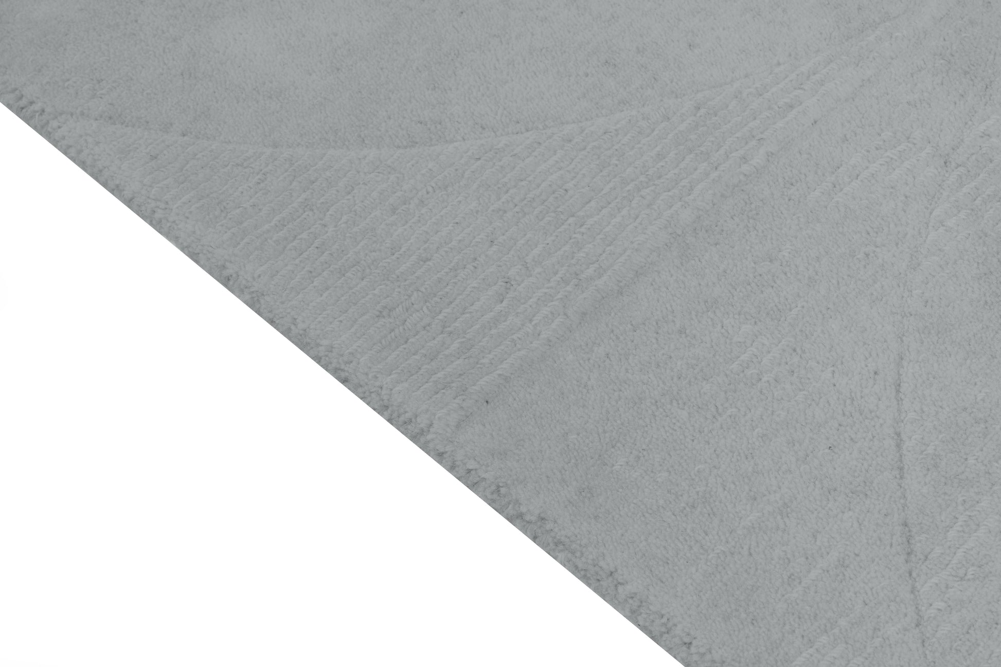 Tapis rectangulaire gris clair, tissage côtelé et bouclé, relief texturé, aspect tactile doux