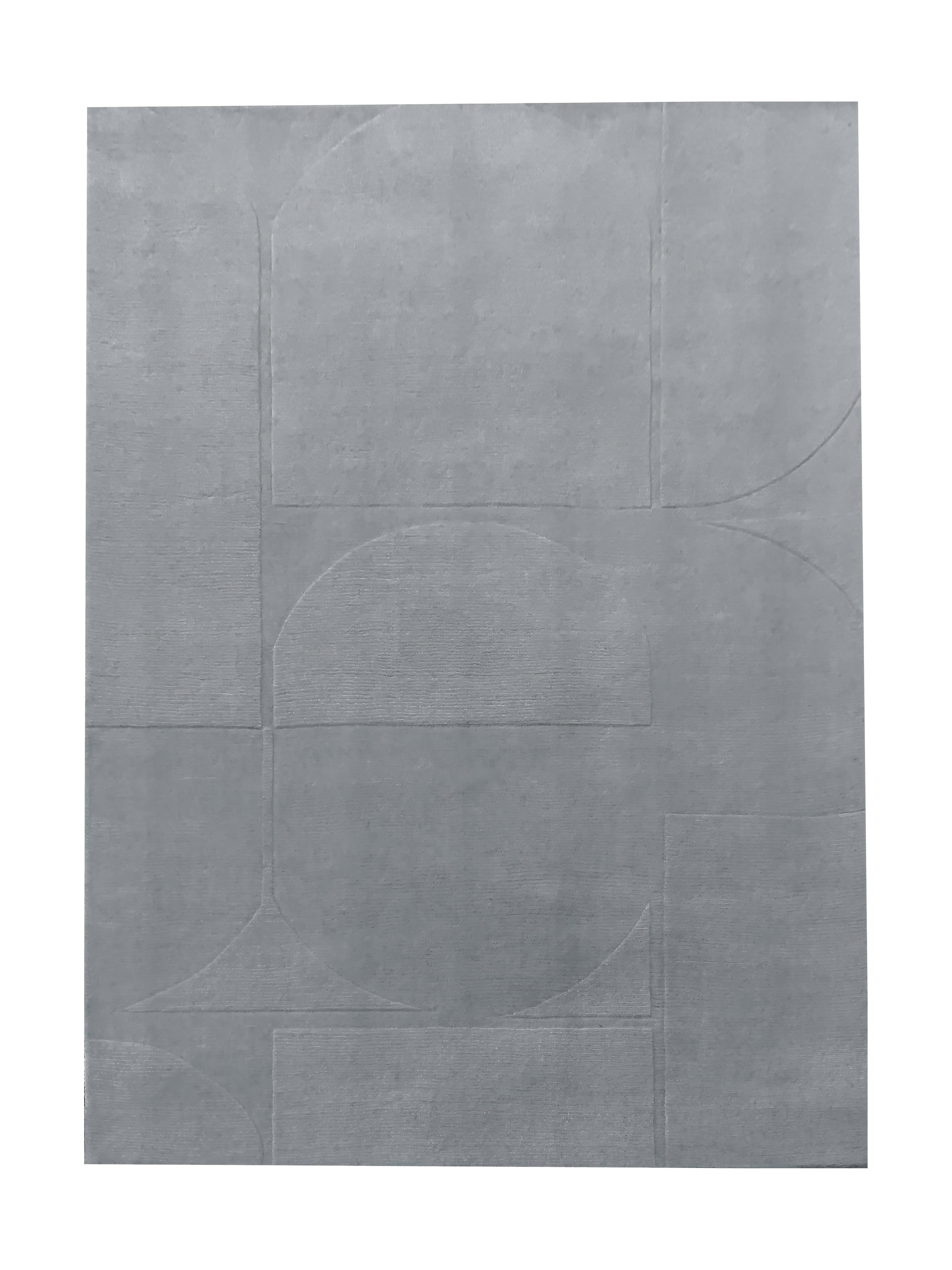 Tapis rectangulaire gris clair, motif géométrique abstrait, ambiance moderne et épurée