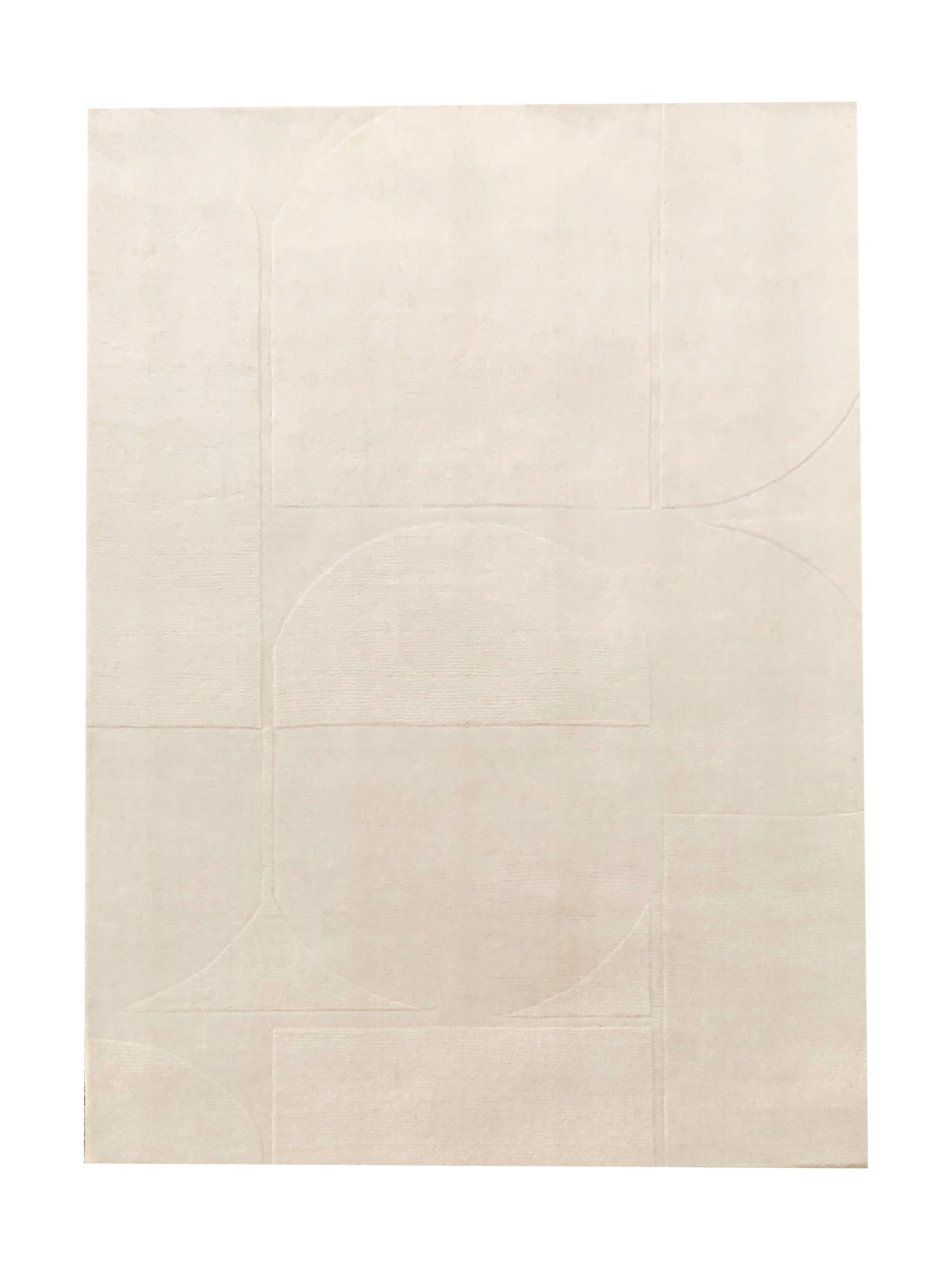 Tapis rectangulaire ivoire avec motif géométrique abstrait. Style contemporain, ambiance épurée