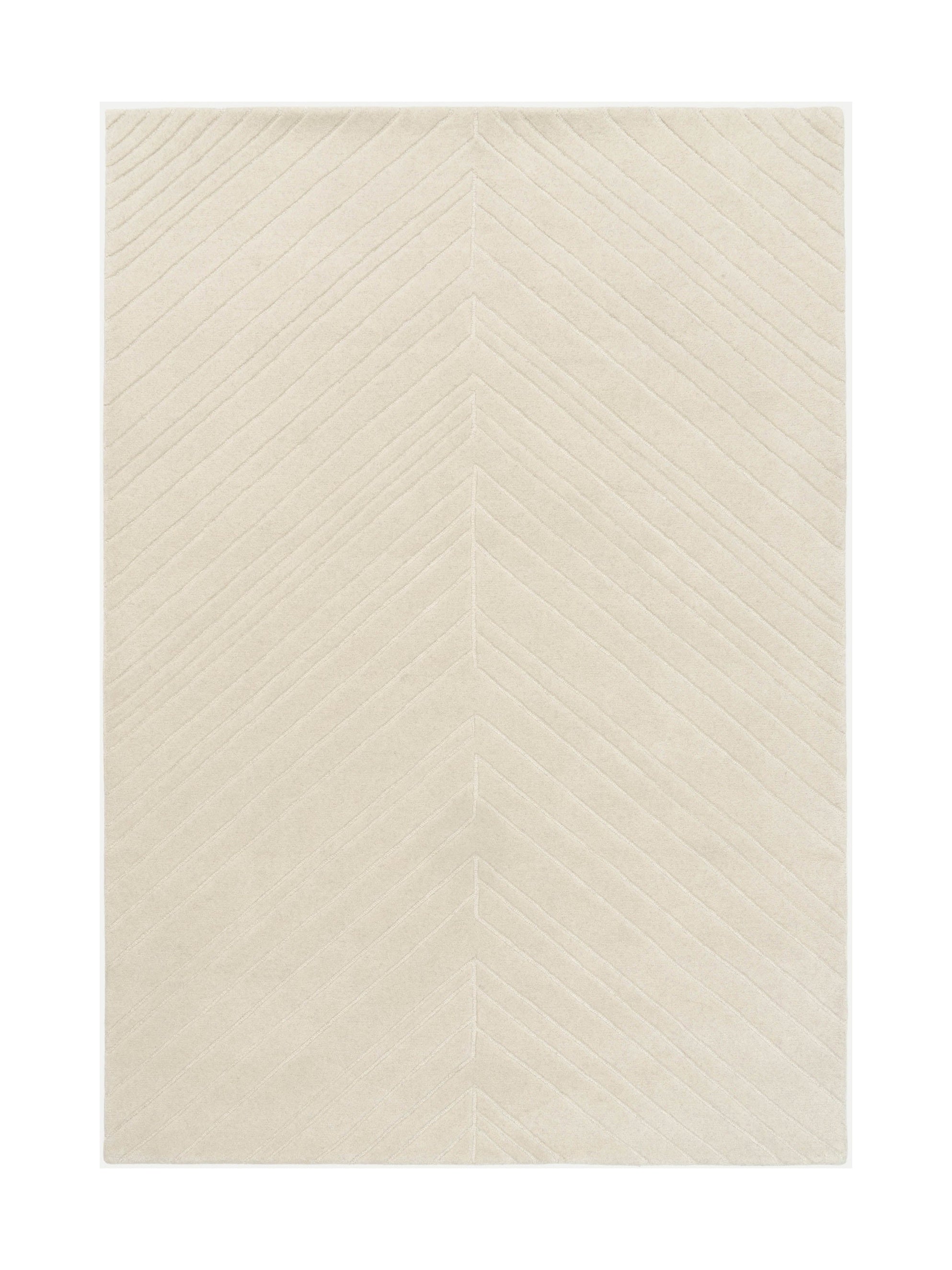 Tapis rectangulaire beige clair avec motif chevron en relief, style moderne et ambiance épurée