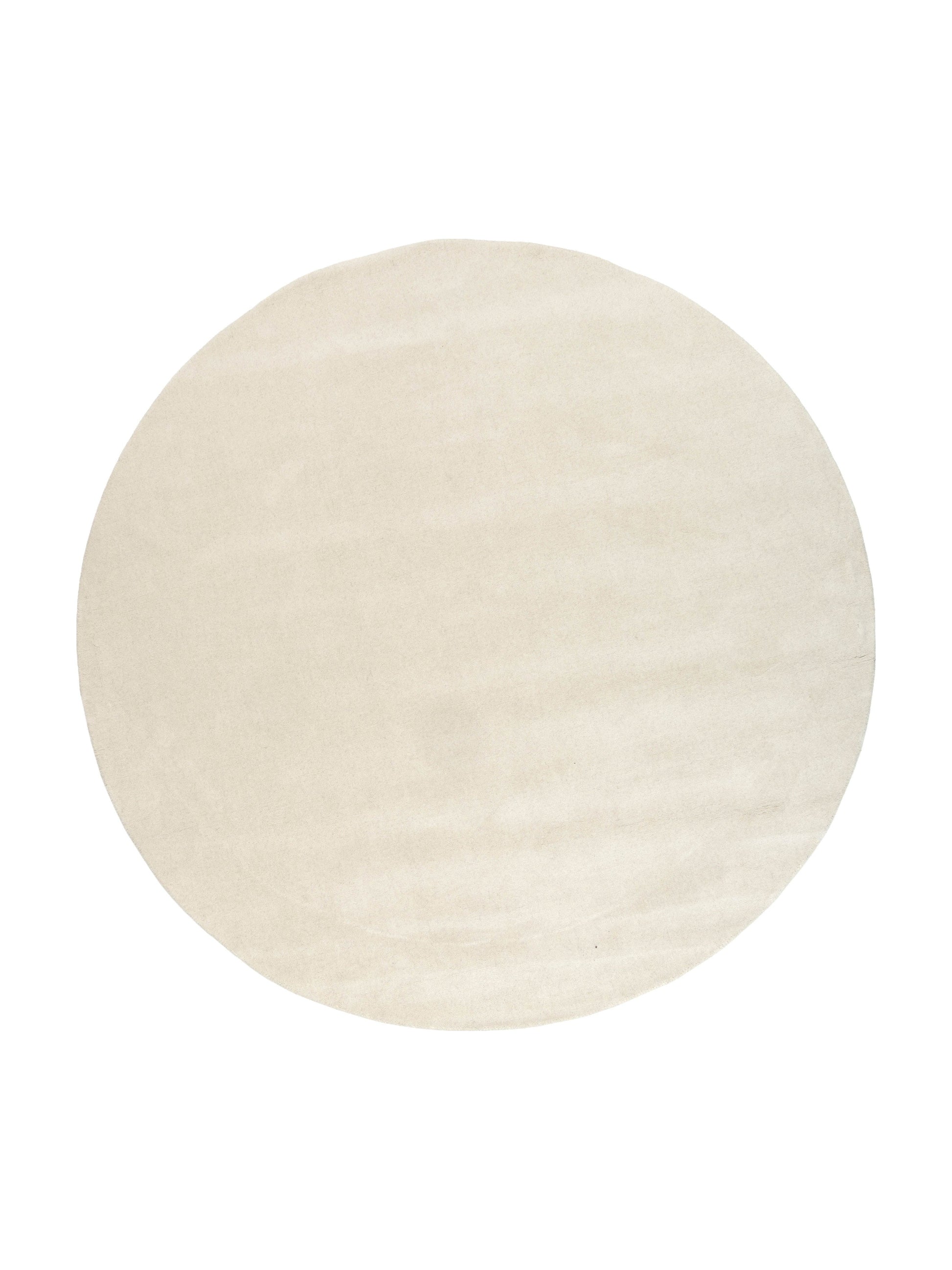 Type tapis rond, couleur ivoire, pièce. Style uni, motif subtil