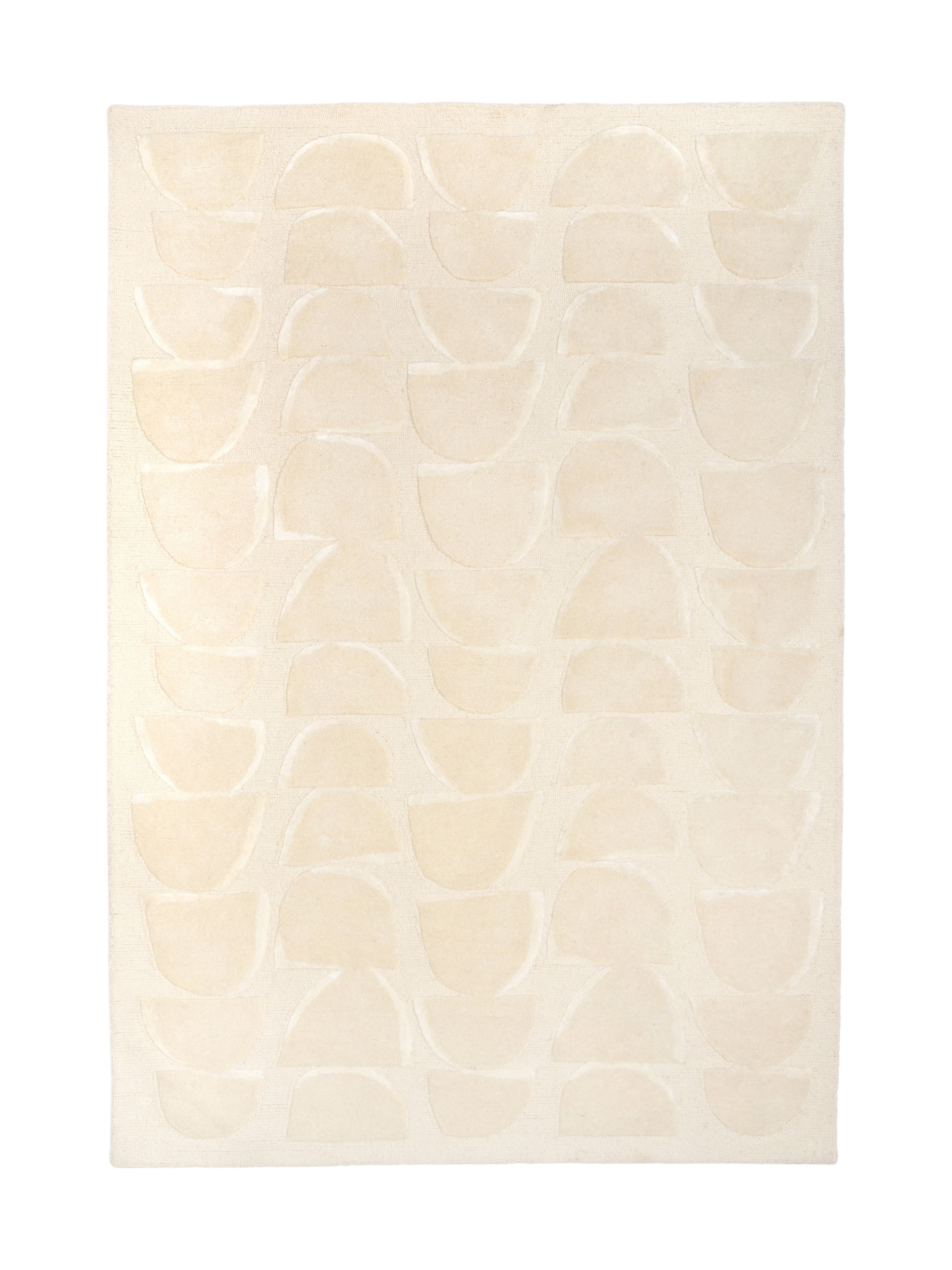 Tapis rectangulaire beige avec motif géométrique en demi-cercles, ambiance douce et épurée