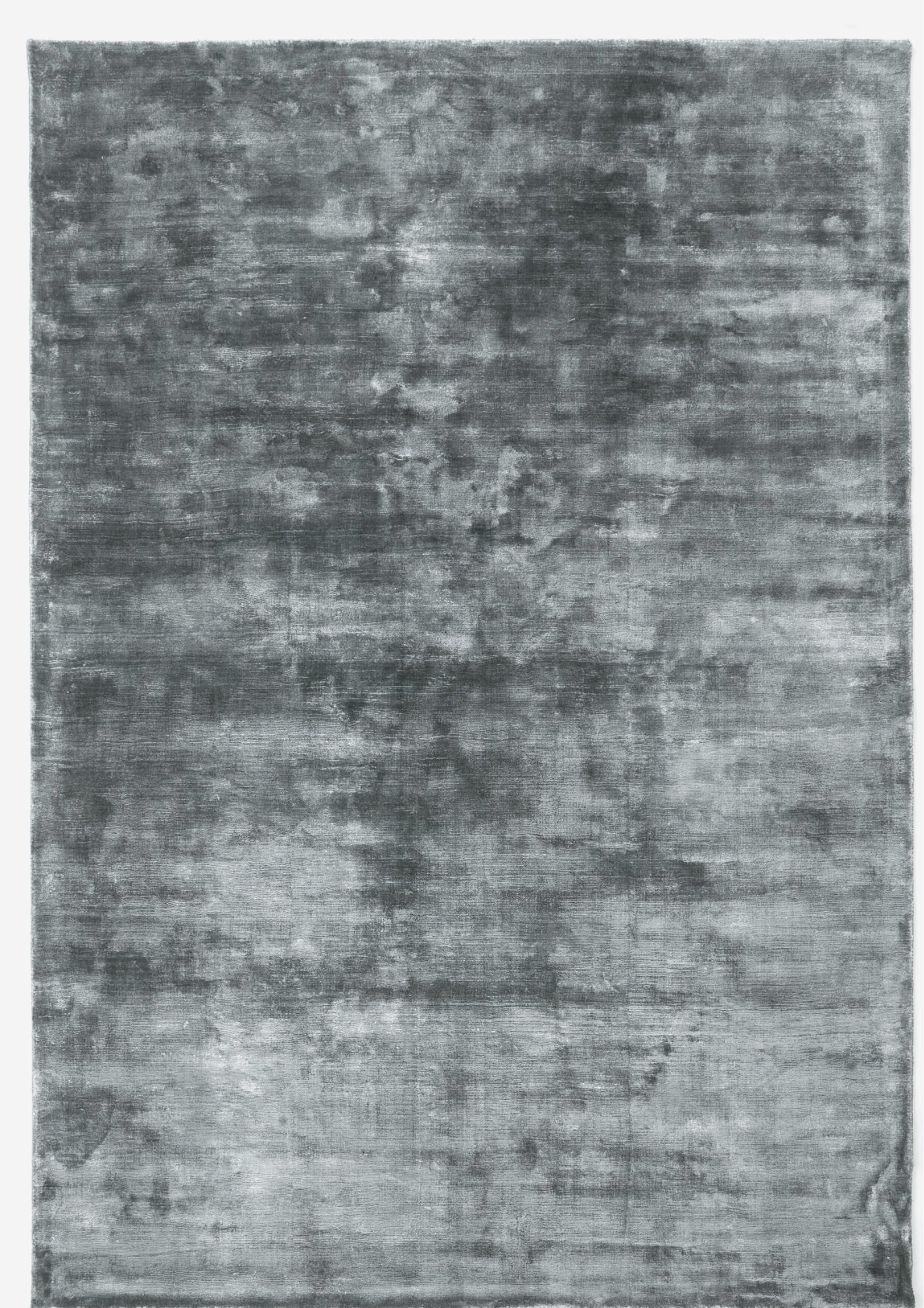 Tapis rectangulaire gris et acier, motif subtil, ambiance feutrée pour salon ou chambre à coucher